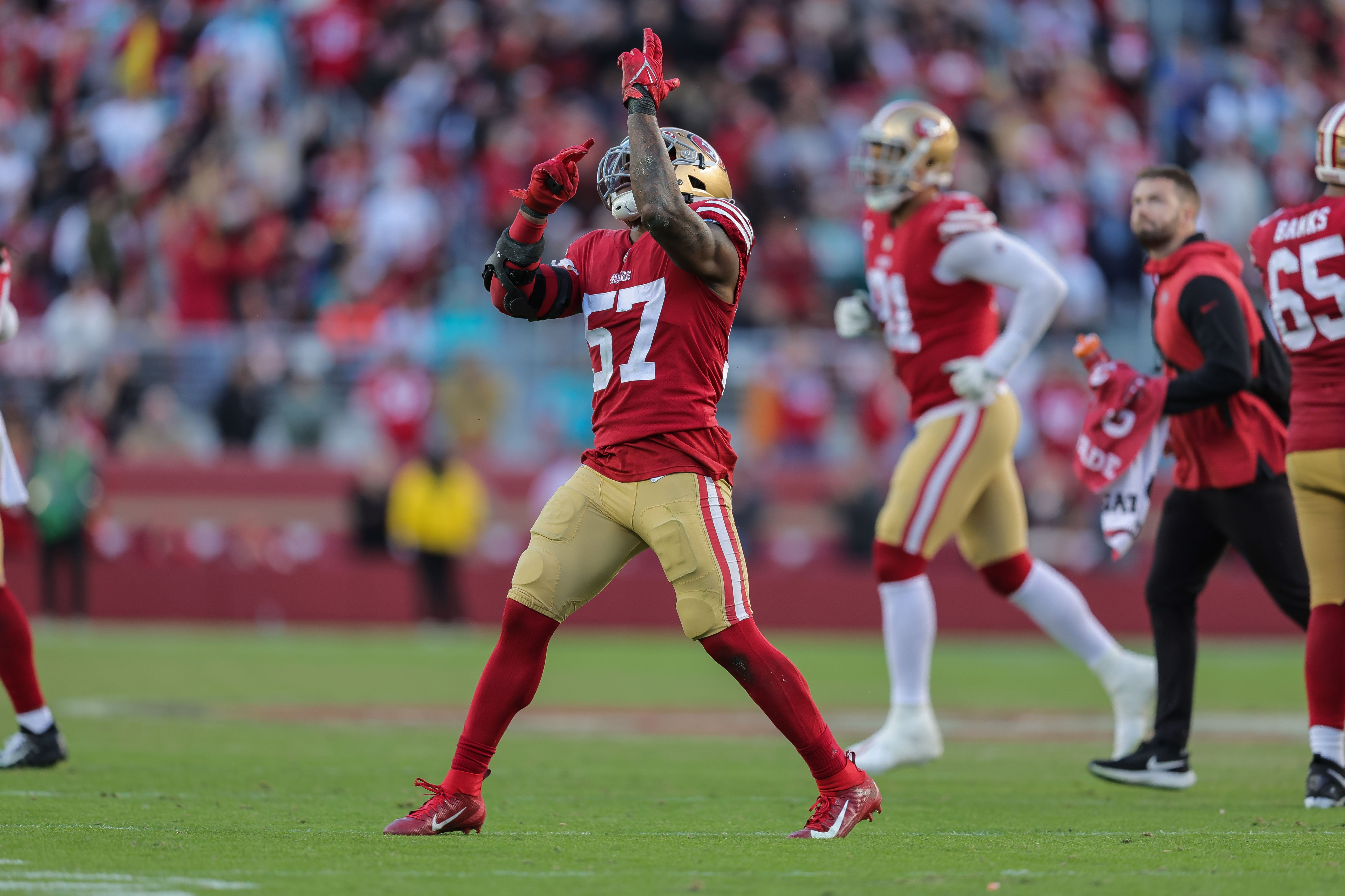 Dec 4, 2022; Santa Clara, California, USA; San Francisco 49ers linebacker Dre Greenlaw (57) celebrates after a play during the fourth quarter against the Miami Dolphins at Levi's Stadium. Mandatory Credit: Sergio Estrada-USA TODAY Sports