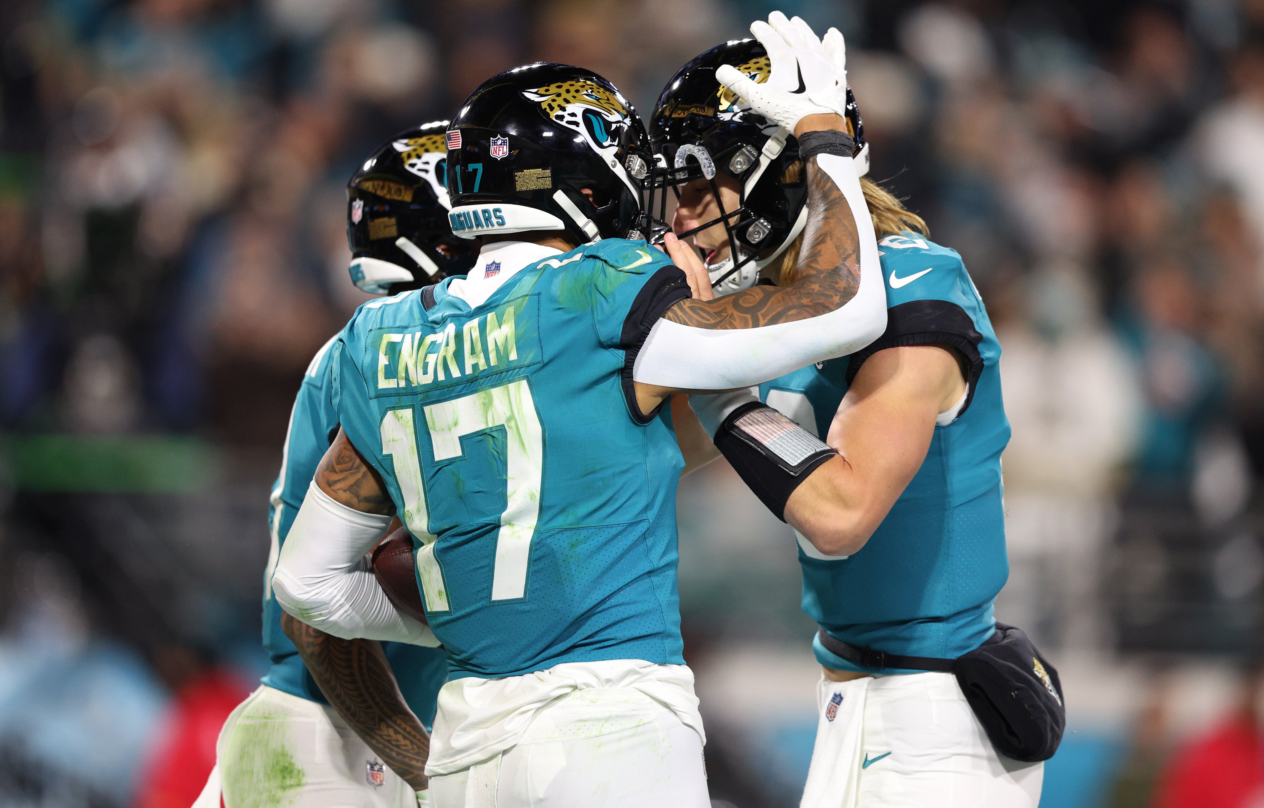 Jacksonville Jaguars TE Evan Engram and QB Trevor Lawrence celebrating a big play.