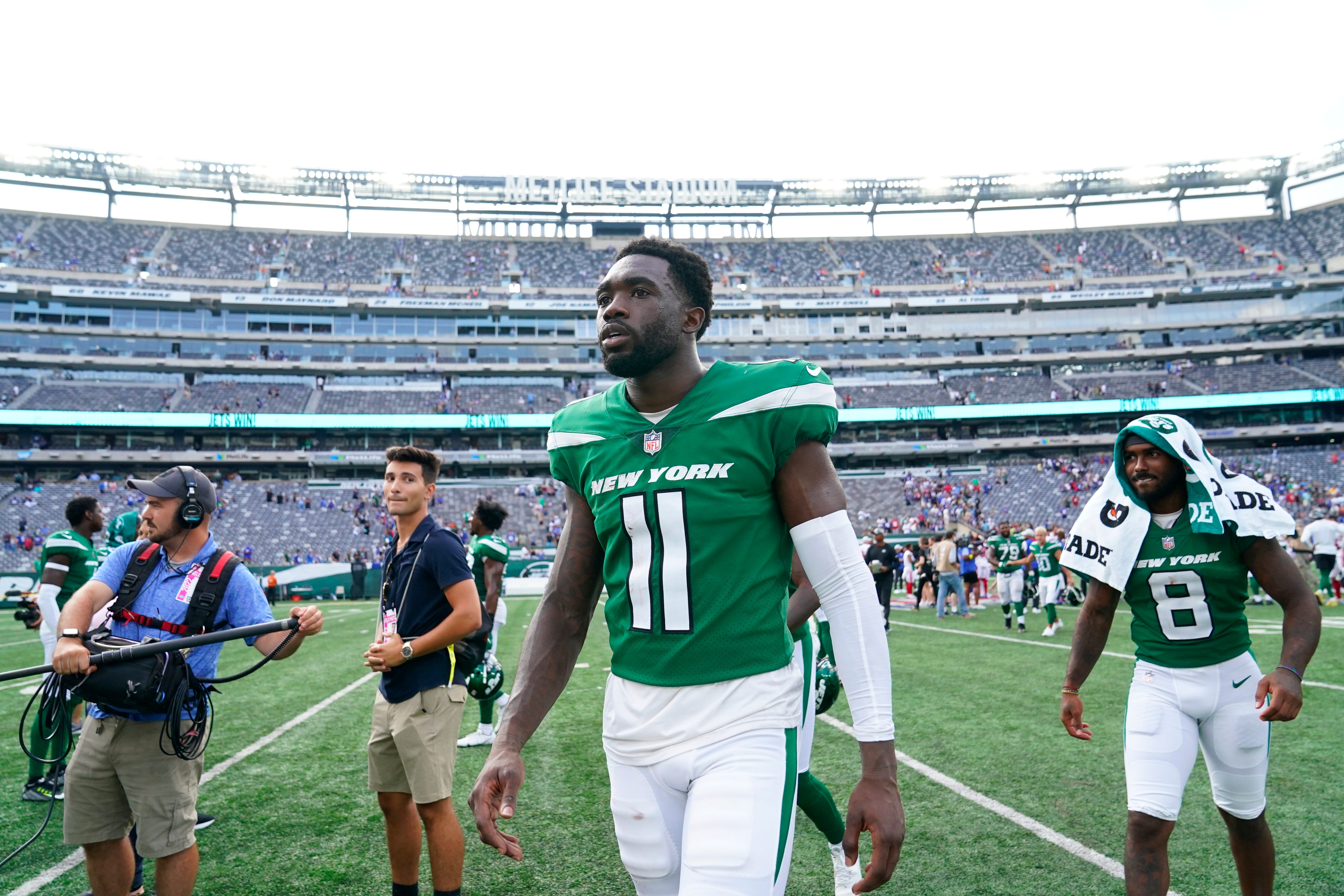 New York Jets wide receiver Denzel Mims (11) walks off the field after a 31-27 win over the New York Giants in a preseason game at MetLife Stadium on Sunday, August 28, 2022.