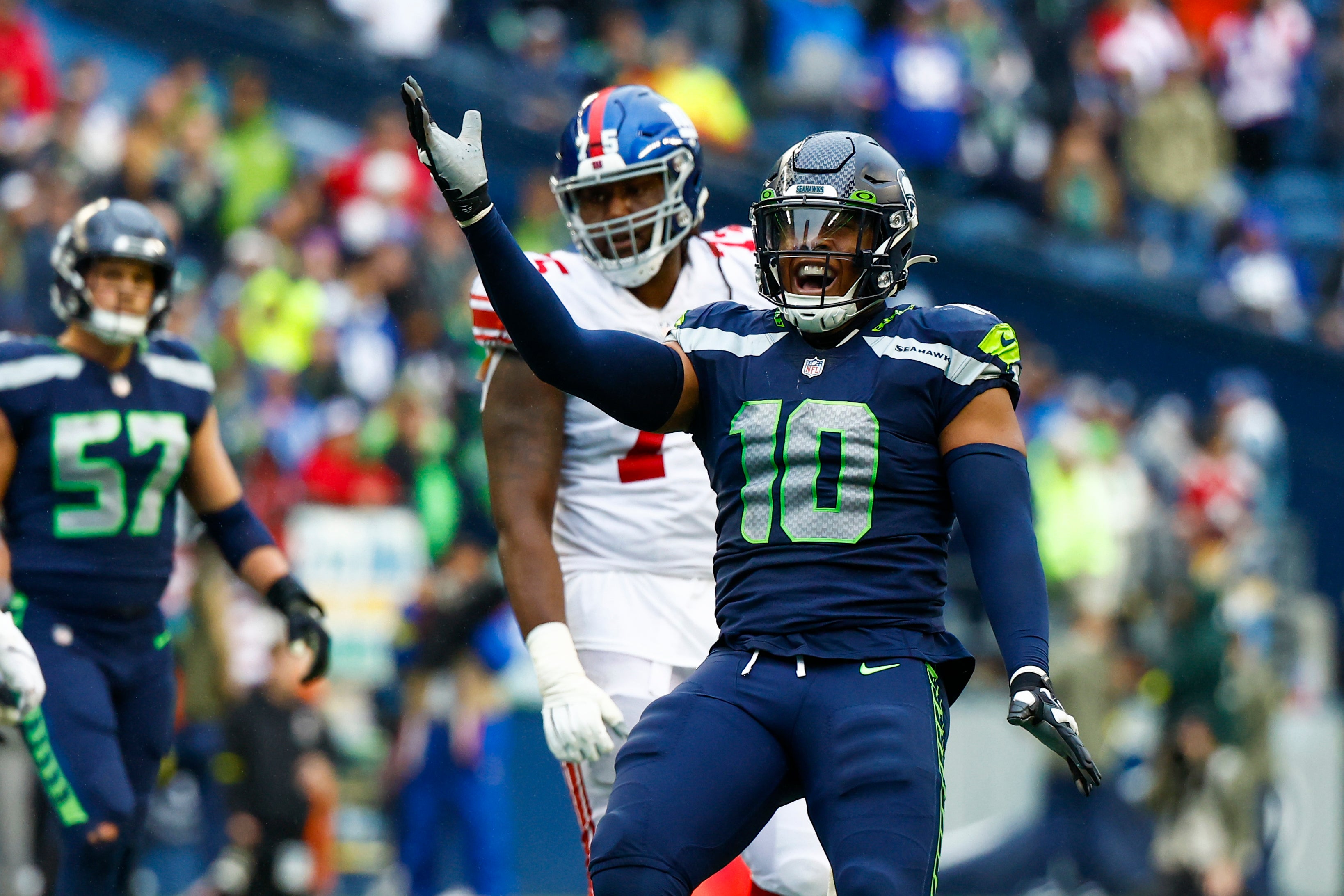 Oct 30, 2022; Seattle, Washington, USA; Seattle Seahawks linebacker Uchenna Nwosu (10) celebrates following a sack against the New York Giants during the fourth quarter at Lumen Field. Mandatory Credit: Joe Nicholson-USA TODAY Sports
