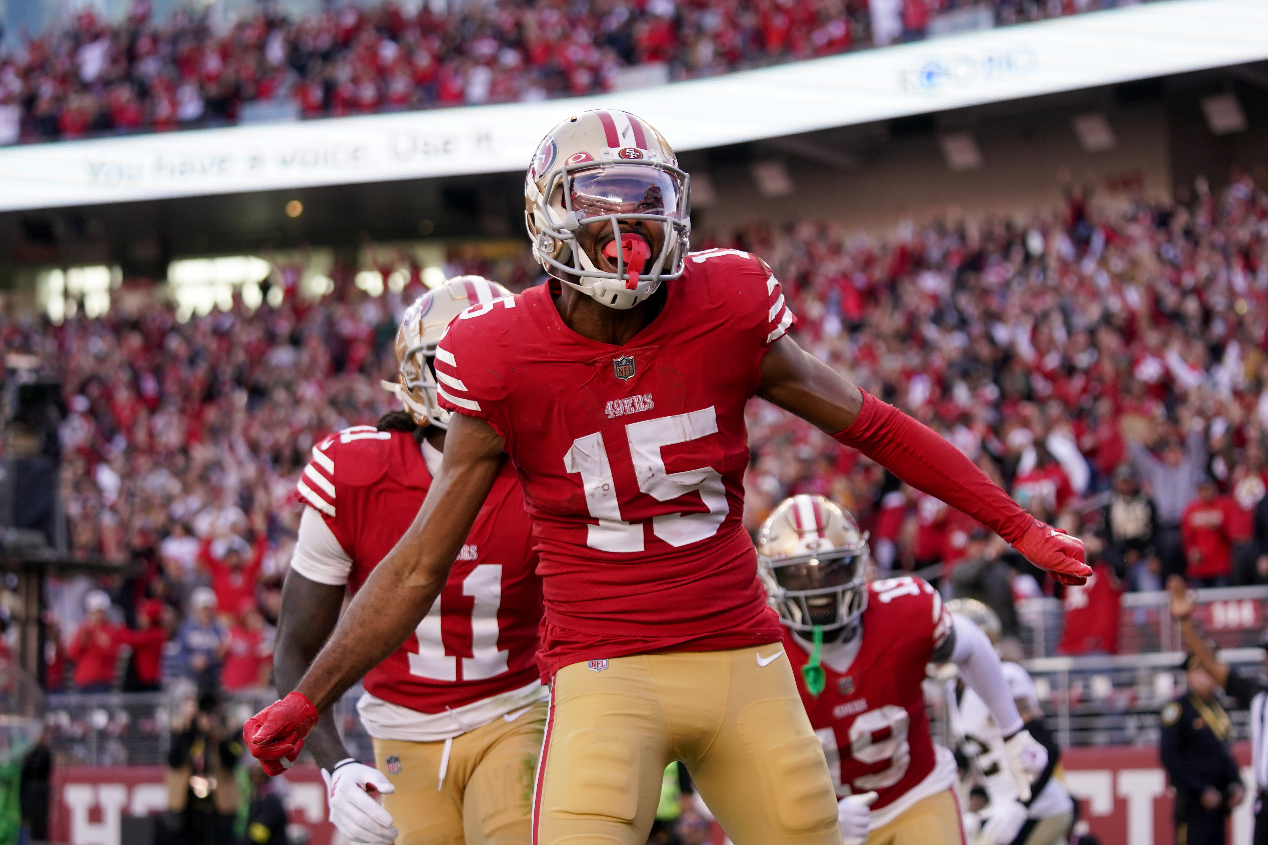 Nov 27, 2022; Santa Clara, California, USA; San Francisco 49ers wide receiver Jauan Jennings (15) celebrates after catching a touchdown against the New Orleans Saints in the second quarter at Levi's Stadium. Mandatory Credit: Cary Edmondson-USA TODAY Sports