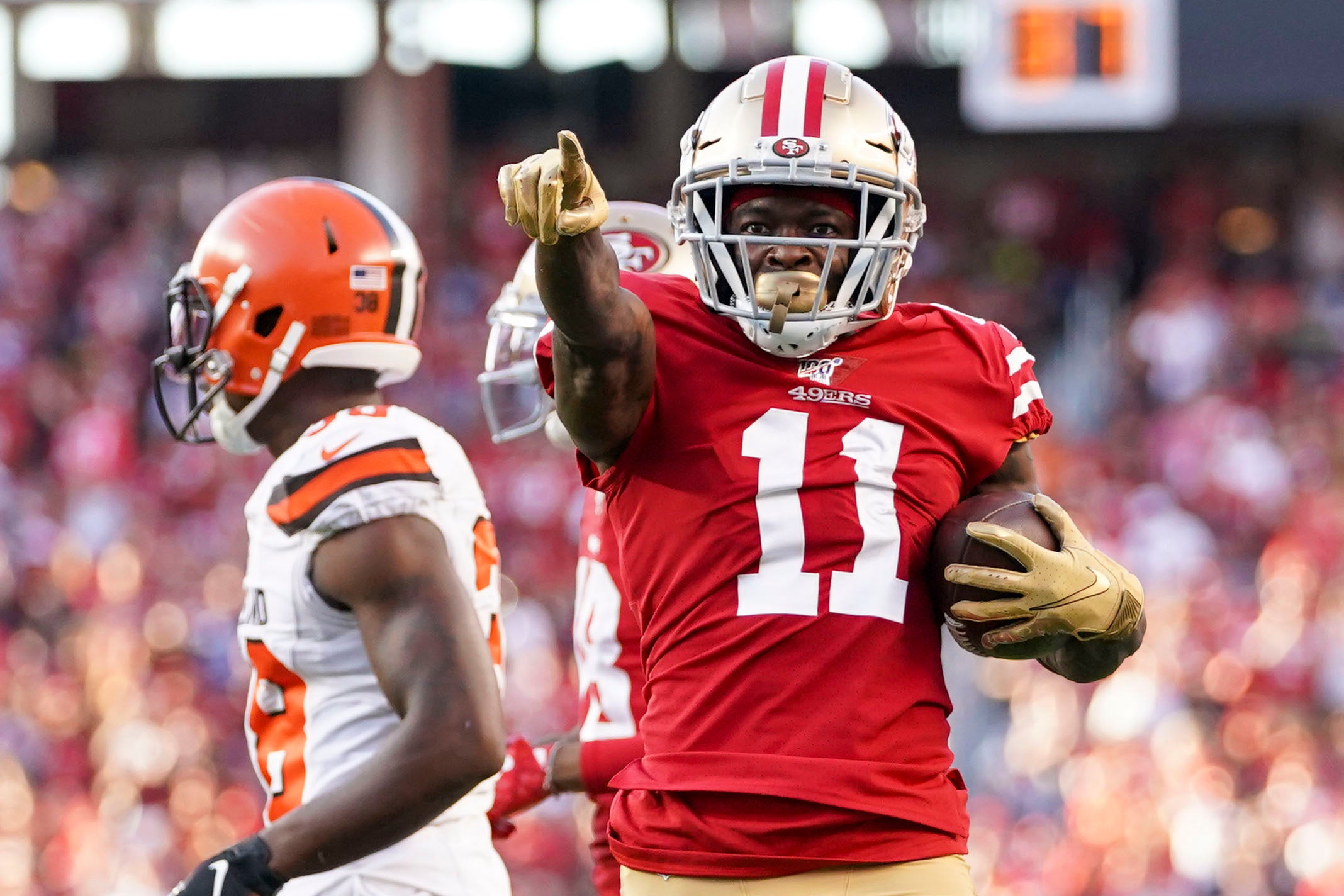 October 7, 2019; Santa Clara, CA, USA; San Francisco 49ers wide receiver Marquise Goodwin (11) celebrates after a run against the Cleveland Browns during the first quarter at Levi s Stadium.