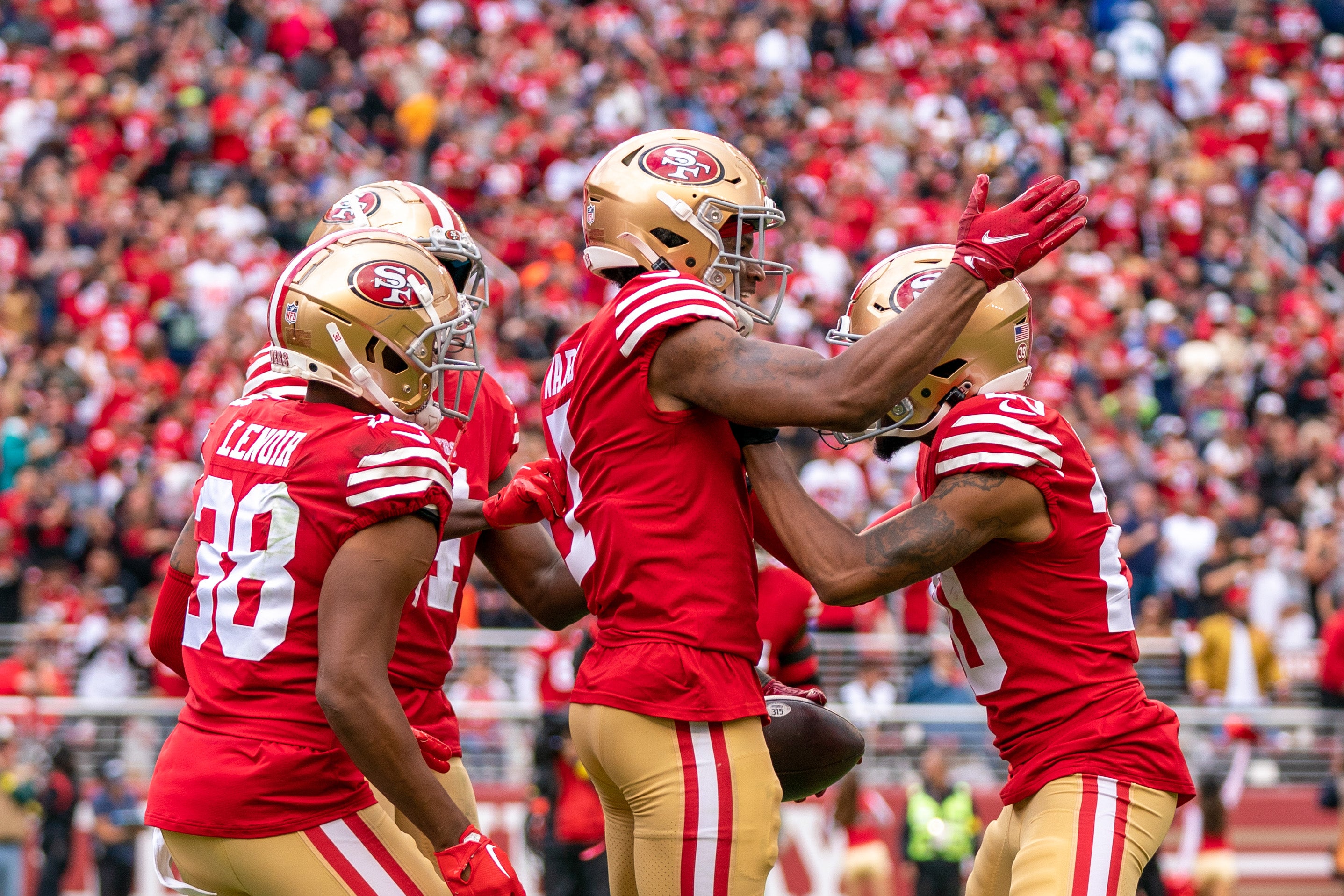 September 18, 2022; Santa Clara, California, USA; San Francisco 49ers cornerback Charvarius Ward (7) is congratulated by cornerback Ambry Thomas (20) during the second quarter against the Seattle Seahawks at Levi's Stadium. Mandatory Credit: Kyle Terada-USA TODAY Sports