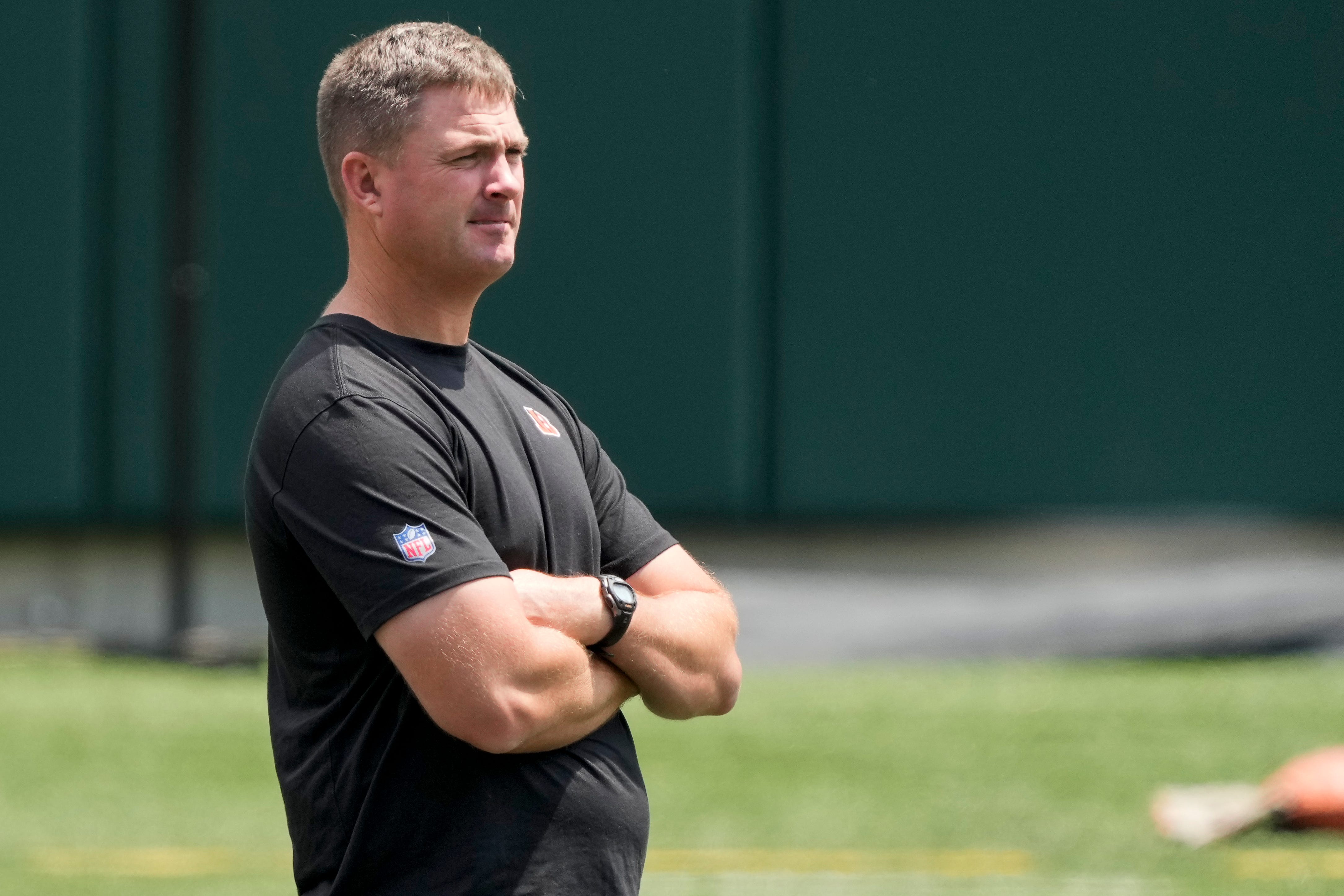 Cincinnati Bengals head coach Zac Taylor watches a drill during an off-season workout inside Paycor Stadium in downtown Cincinnati on Wednesday, June 14, 2023.