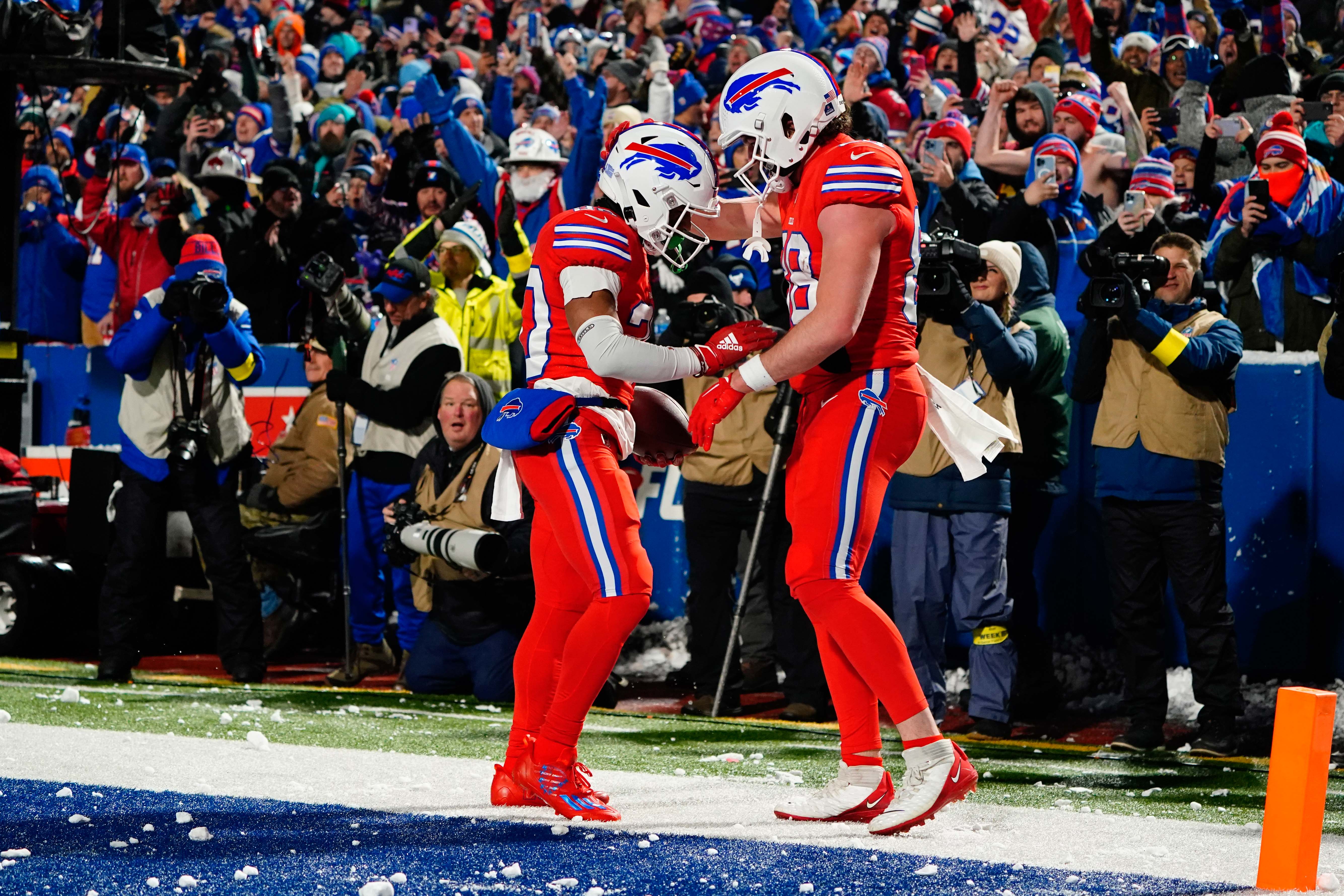 Buffalo Bills RB Nyheim Hines celebrating after scoring a touchdown against the Miami Dolphins.