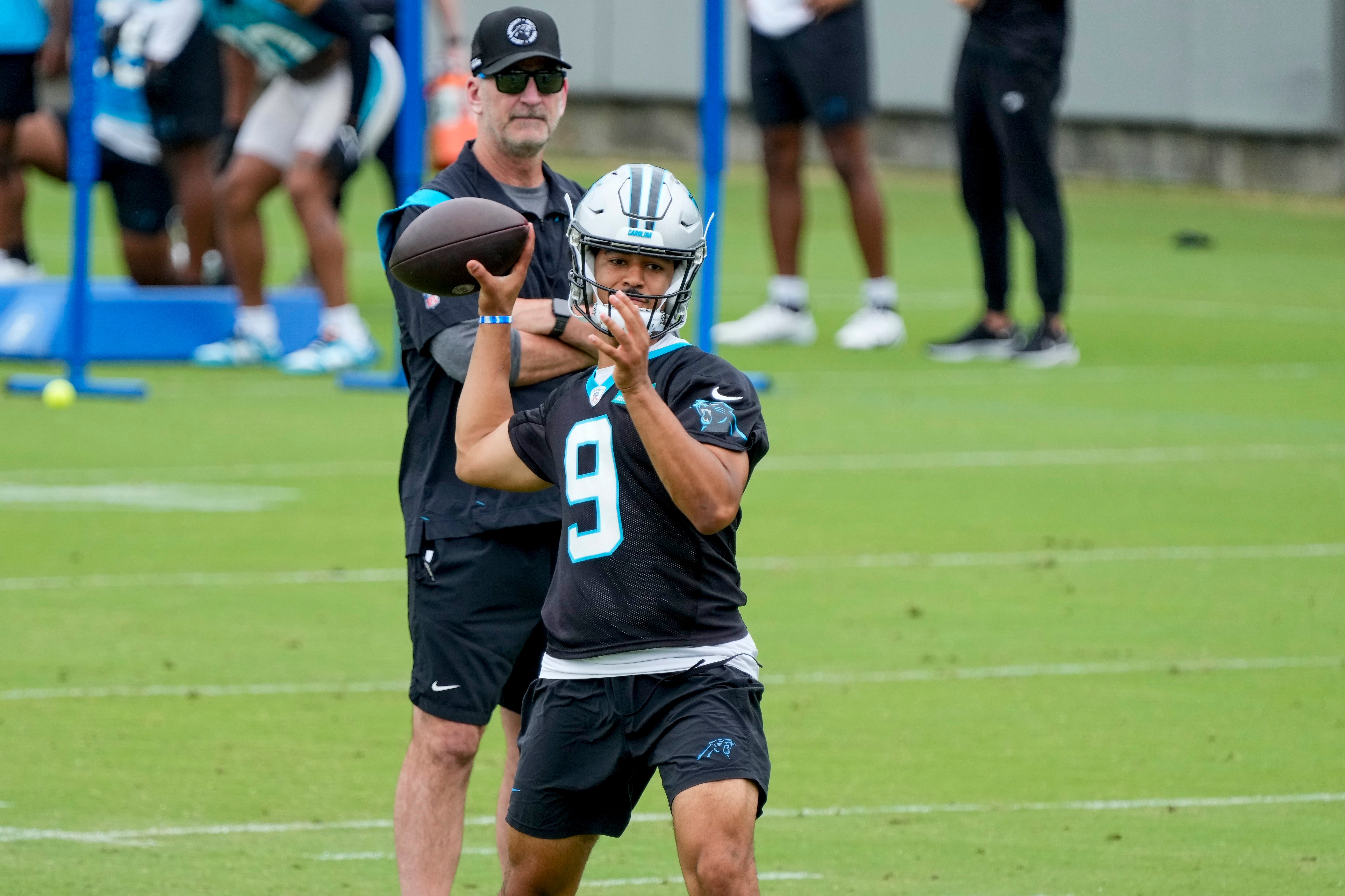 Jun 14, 2023; Charlotte, NC, USA; Carolina Panthers head coach Frank Reich watches quarterback Bryce Young (9) during the Carolina Panthers minicamp.