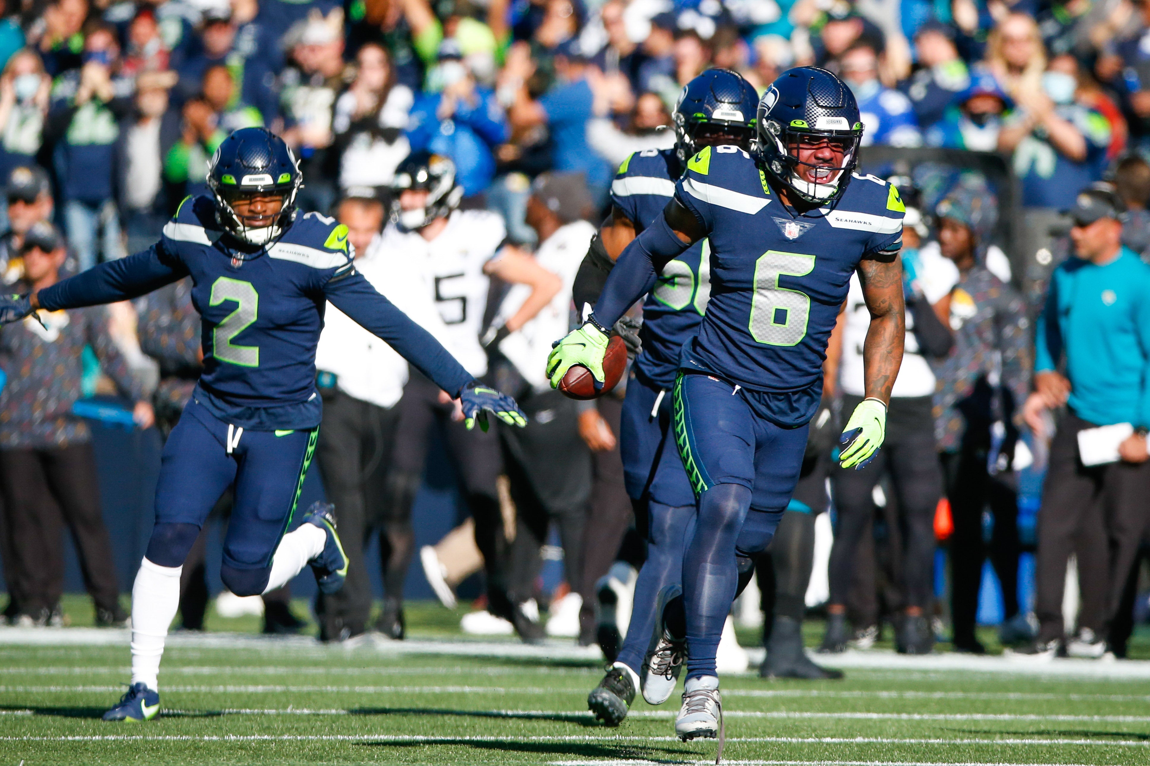 Oct 31, 2021; Seattle, Washington, USA; Seattle Seahawks free safety Quandre Diggs (6) celebrates following an interception against the Jacksonville Jaguars during the second quarter at Lumen Field. Mandatory Credit: Joe Nicholson-USA TODAY Sports