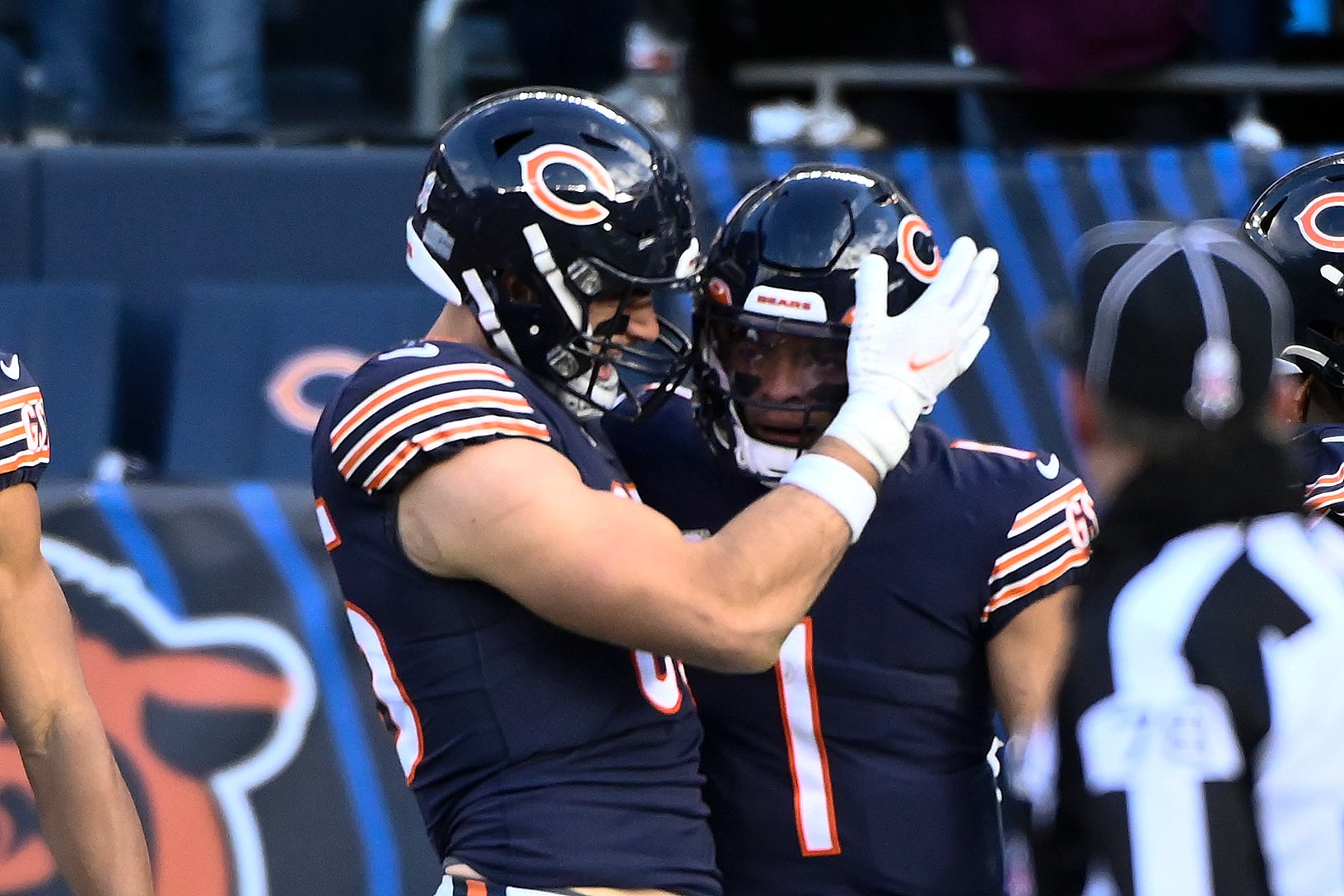 Nov 13, 2022; Chicago, Illinois, USA; Chicago Bears quarterback Justin Fields (1) celebrates with Chicago Bears tight end Cole Kmet (85, left, after he runs for a touchdown against the Detroit Lions during the second half at Soldier Field.
