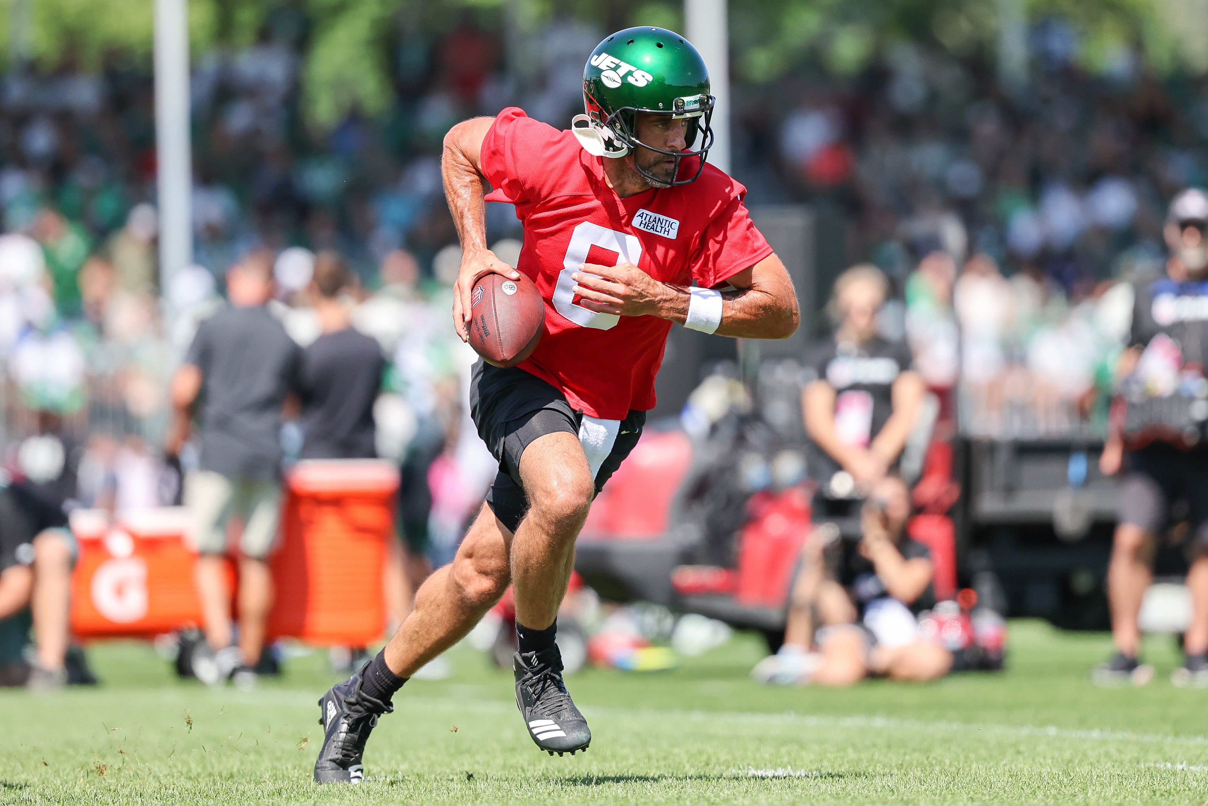 New York Jets quarterback Aaron Rodgers (8) participates in drills during the New York Jets Training Camp at Atlantic Health Jets Training Center.