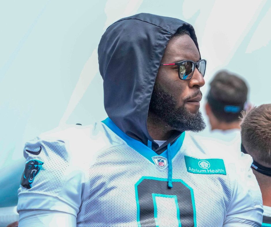Jun 14, 2023; Charlotte, NC, USA; Carolina Panthers linebacker Brian Burns (0) and wide receiver Laviska Shenault Jr. (5) on the way to practice during the Carolina Panthers minicamp.