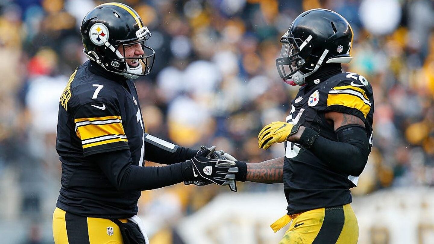 Jan 8, 2017; Pittsburgh, PA, USA; Pittsburgh Steelers quarterback Ben Roethlisberger (7) celebrates with Pittsburgh Steelers running back Le'Veon Bell (26) after a touchdown against the Miami Dolphins during the first half in the AFC Wild Card playoff football game at Heinz Field.