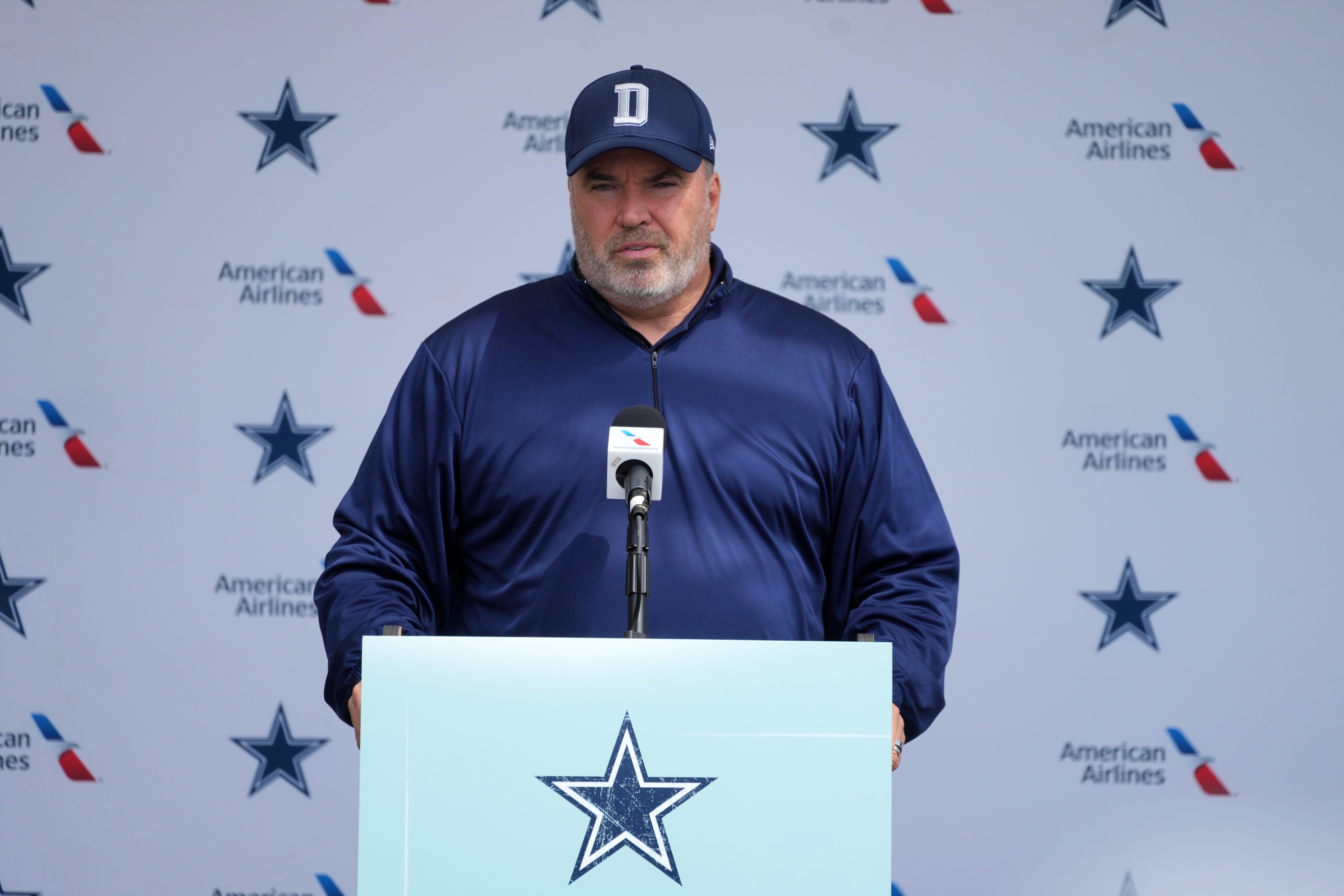 Dallas Cowboys HC Mike McCarthy talking to reporters in training camp.