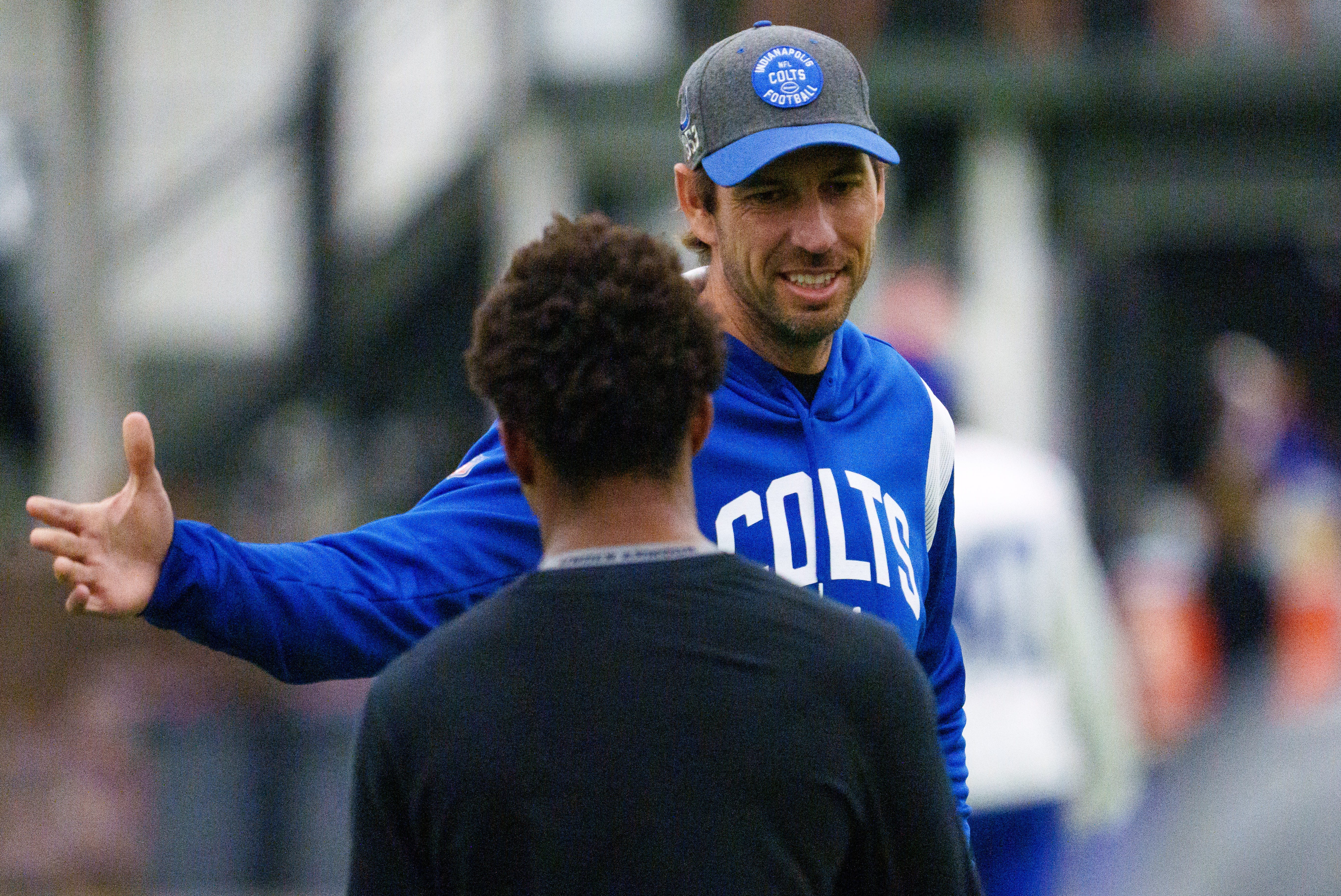 Indianapolis Colts head coach Shane Steichen welcomes a youngster Friday, July 28, 2023, during an indoor practice at Grand Park Sports Campus in Westfield, Indiana.