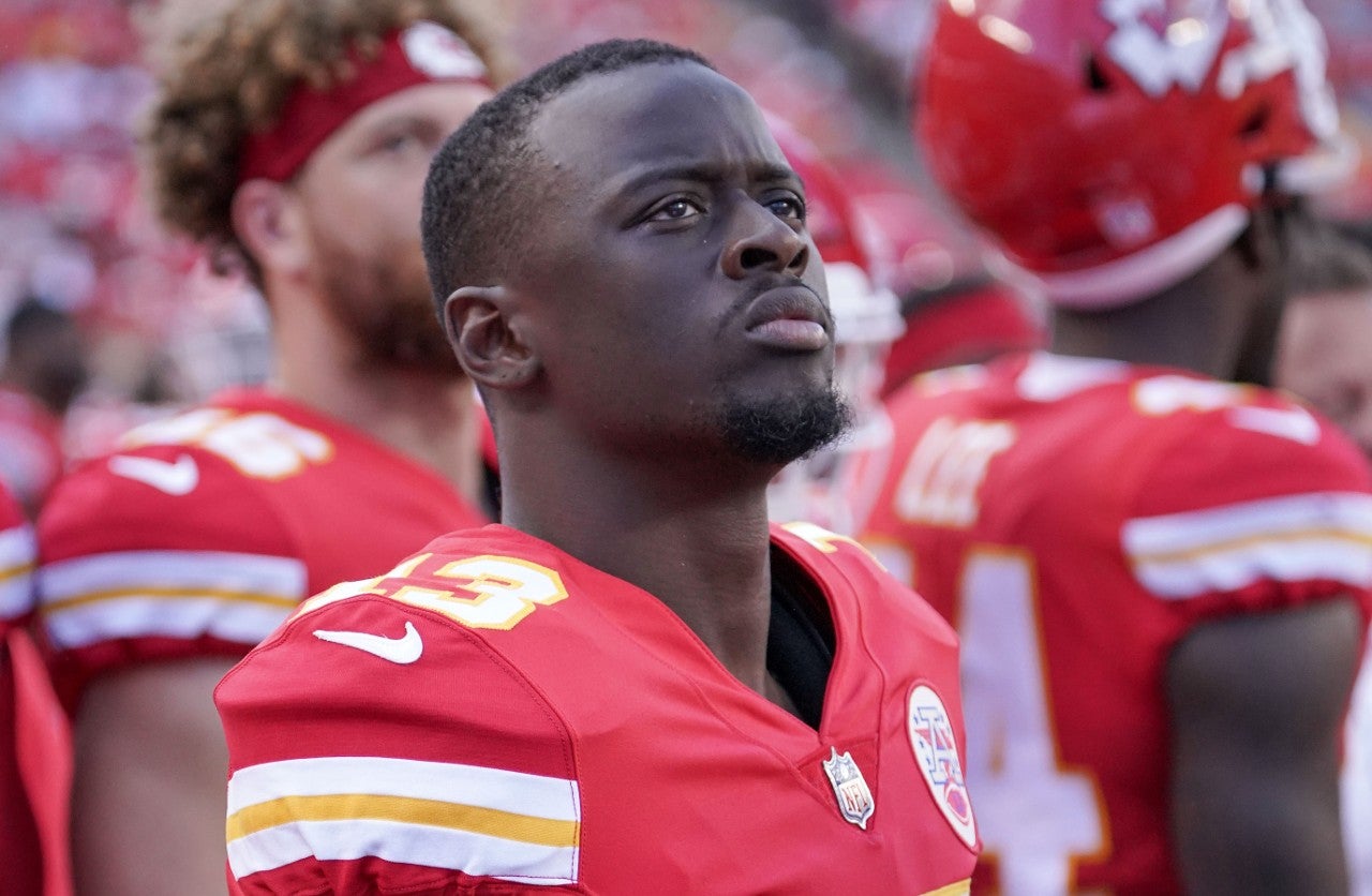 Aug 20, 2022; Kansas City, Missouri, USA; Kansas City Chiefs safety Nazeeh Johnson (13) watches play against the Washington Commanders during the game at GEHA Field at Arrowhead Stadium.