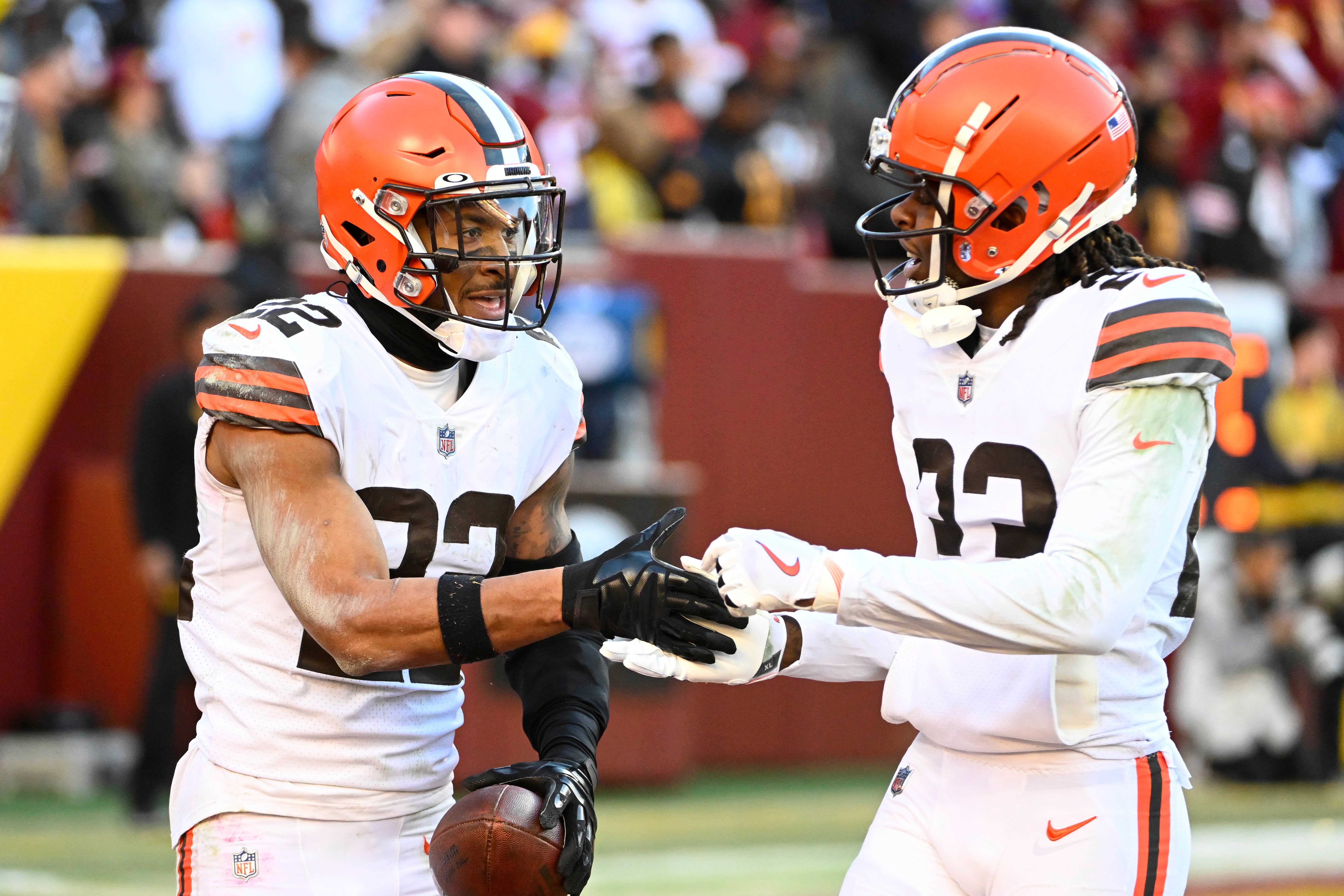 Jan 1, 2023; Landover, Maryland, USA; Cleveland Browns safety Grant Delpit (22) is congratulated by cornerback Martin Emerson Jr. (23) after catching an interception against the Washington Commanders during the second half at FedExField.