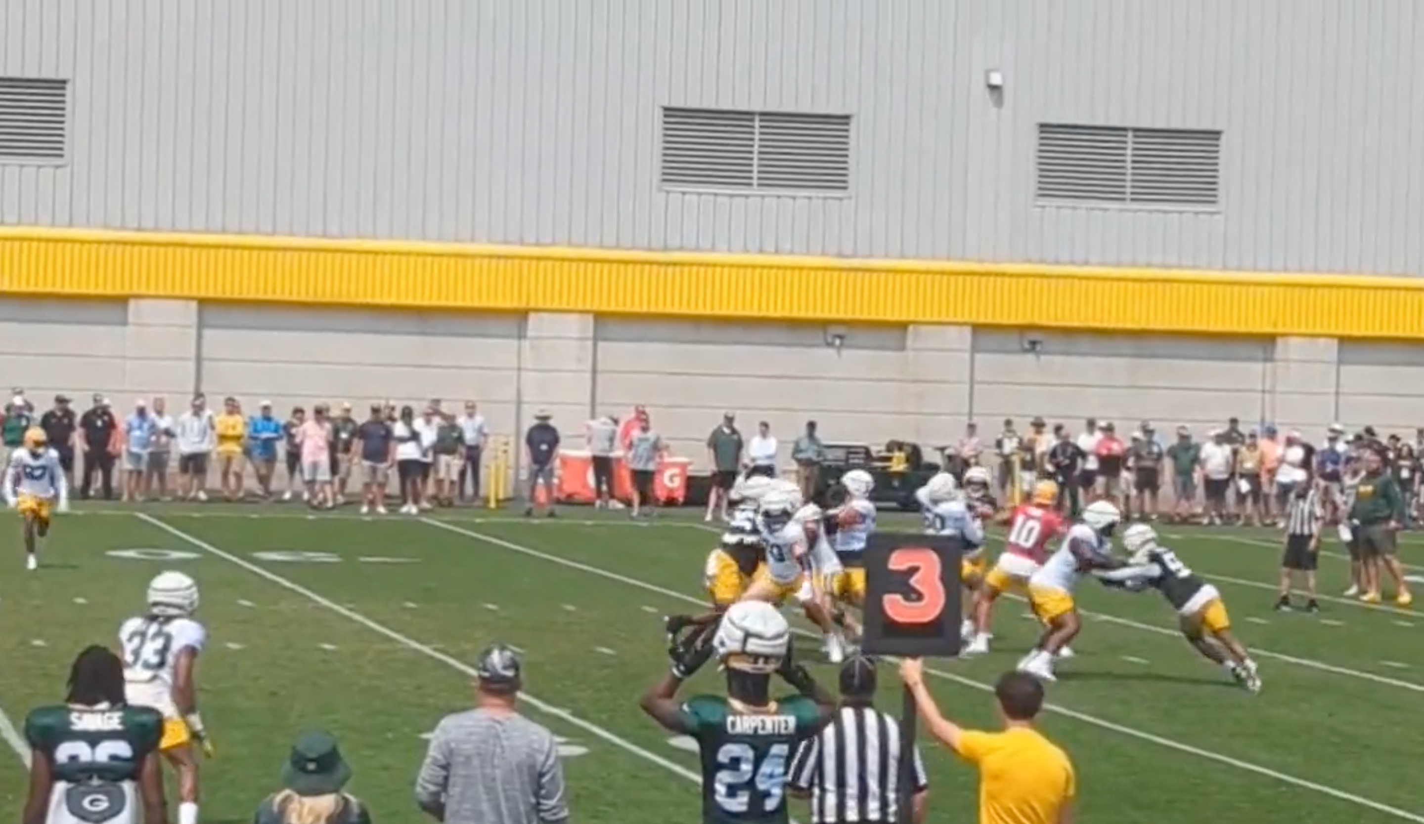 Jordan Love throws deep to Christian Watson.