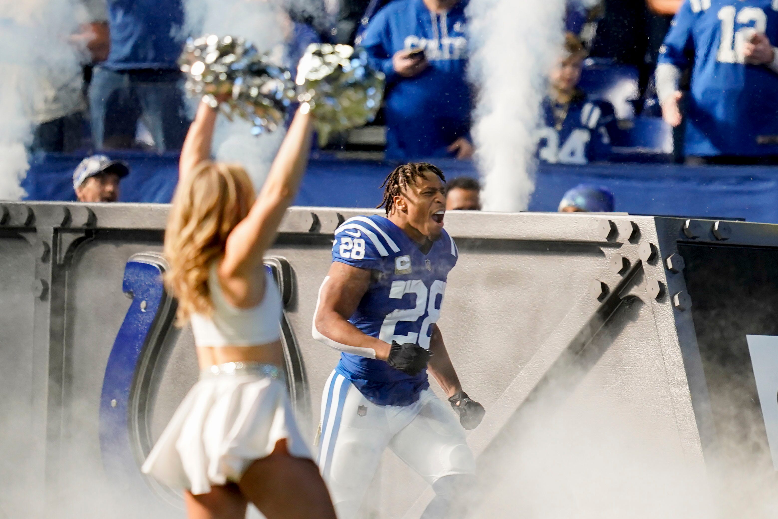 Indianapolis Colts running back Jonathan Taylor (28) runs out of the tunnel Sunday, Nov. 20, 2022, before a game against the Philadelphia Eagles at Lucas Oil Stadium in Indianapolis.