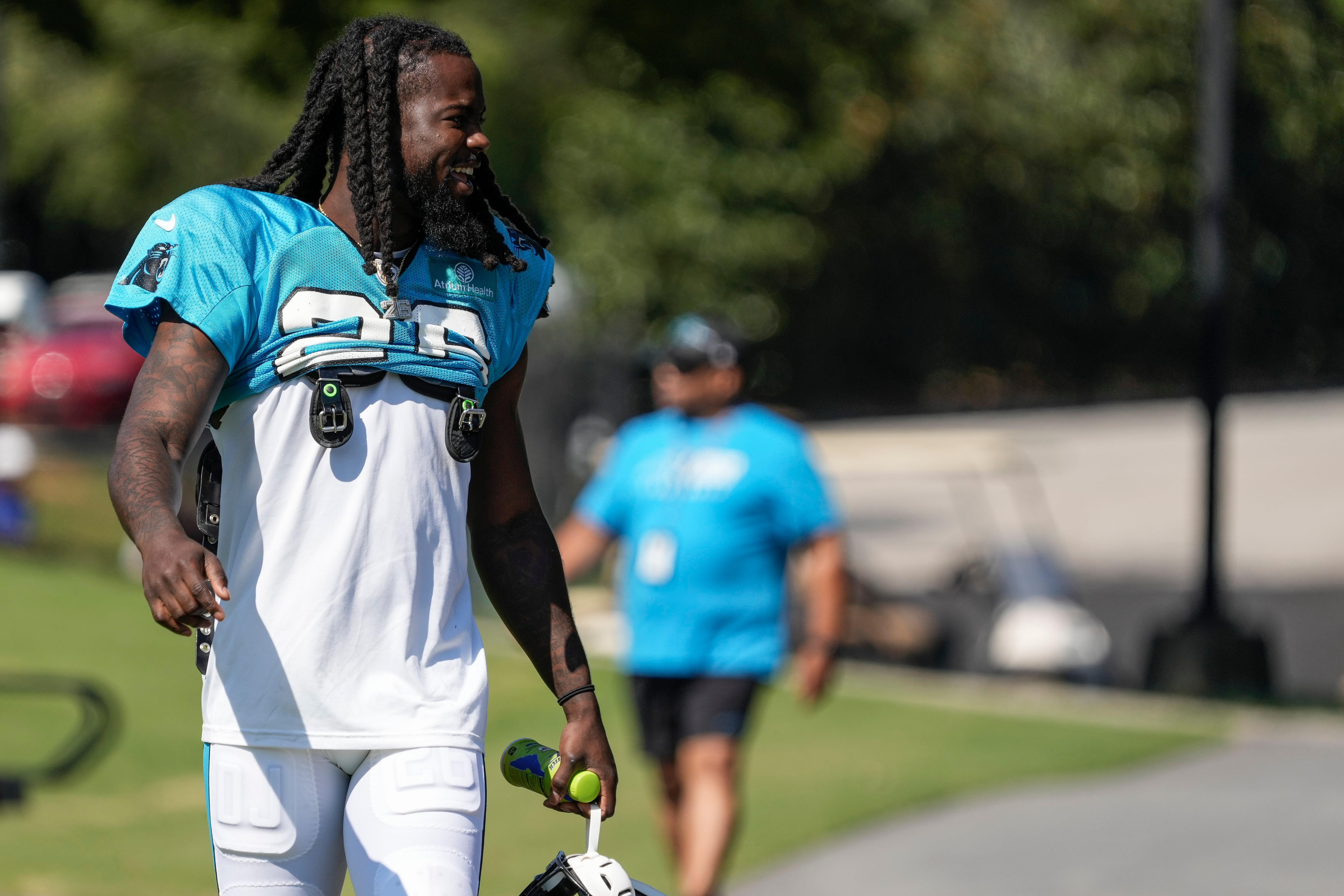 ul 31, 2023; Spartanburg, SC, USA; Carolina Panthers cornerback Donte Jackson (26) talks to fans on the walk to practice during training camp at Wofford College.