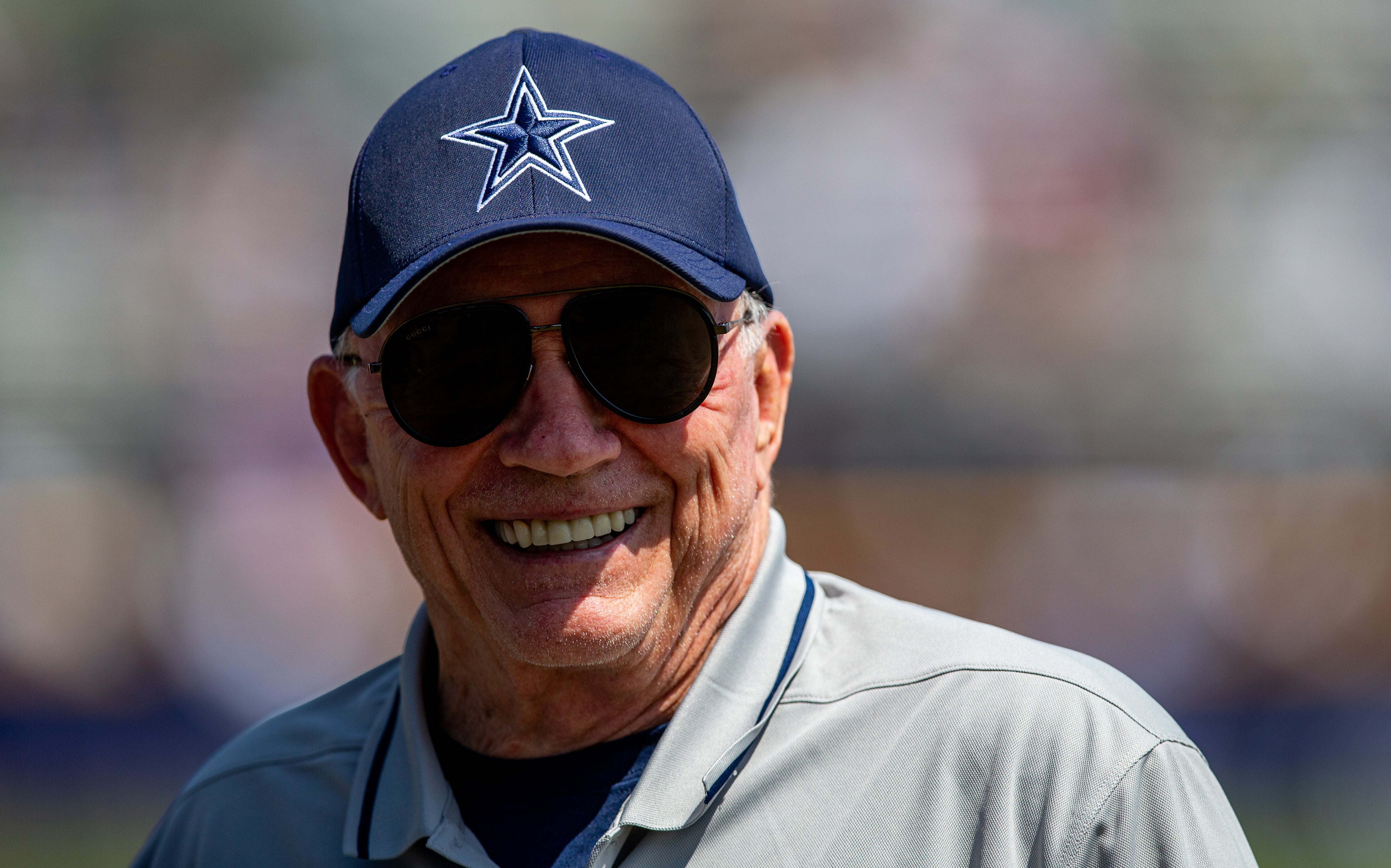 Dallas Cowboys owner Jerry Jones smiles in training camp ahead of the 2023 NFL season.