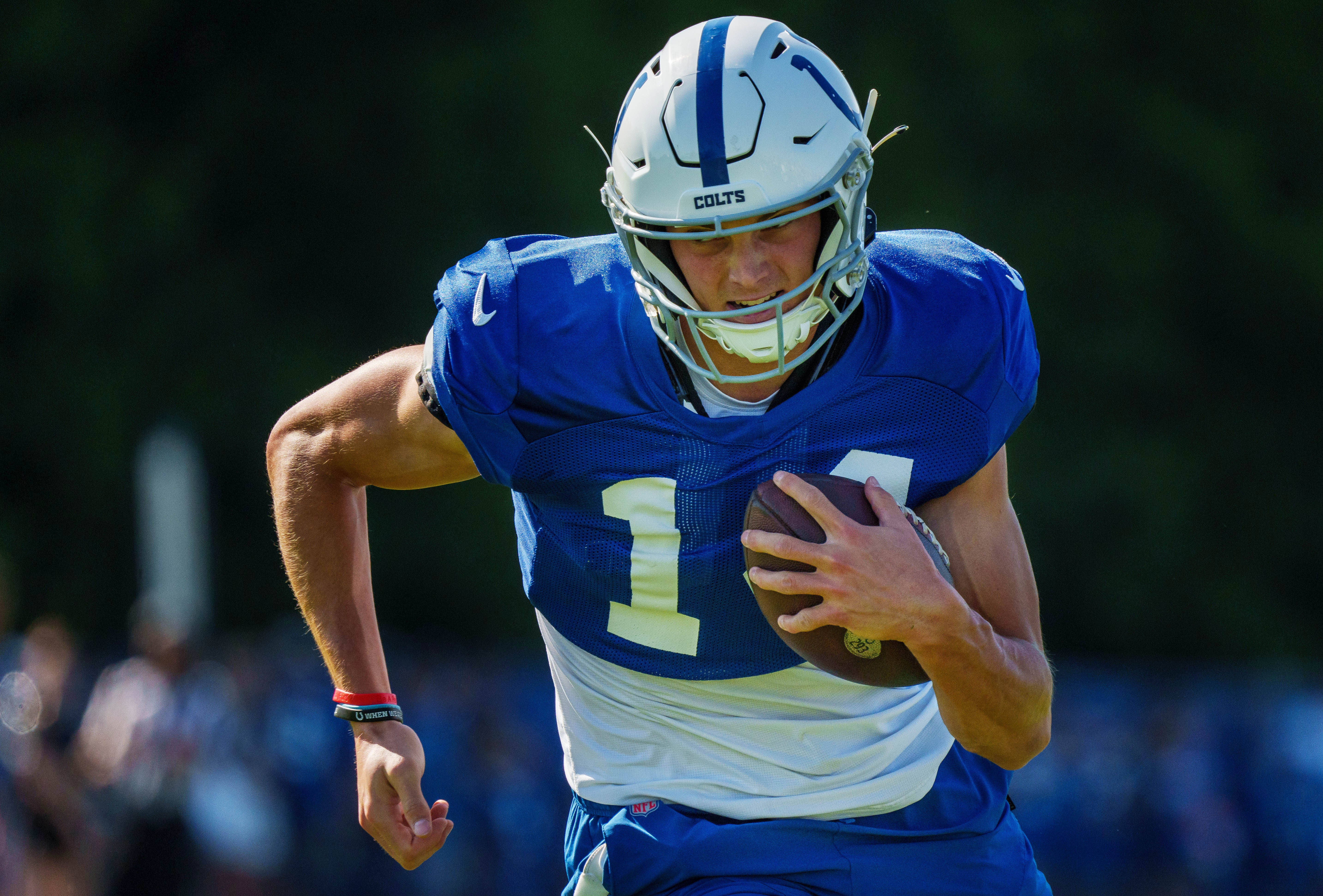 July 31, 2023; Westfield, IN, USA; Indianapolis Colts wide receiver Alec Pierce (14) runs after catching a pass Monday, July 31, 2023, during training camp at the Grand Park Sports Campus in Westfield, Indiana.