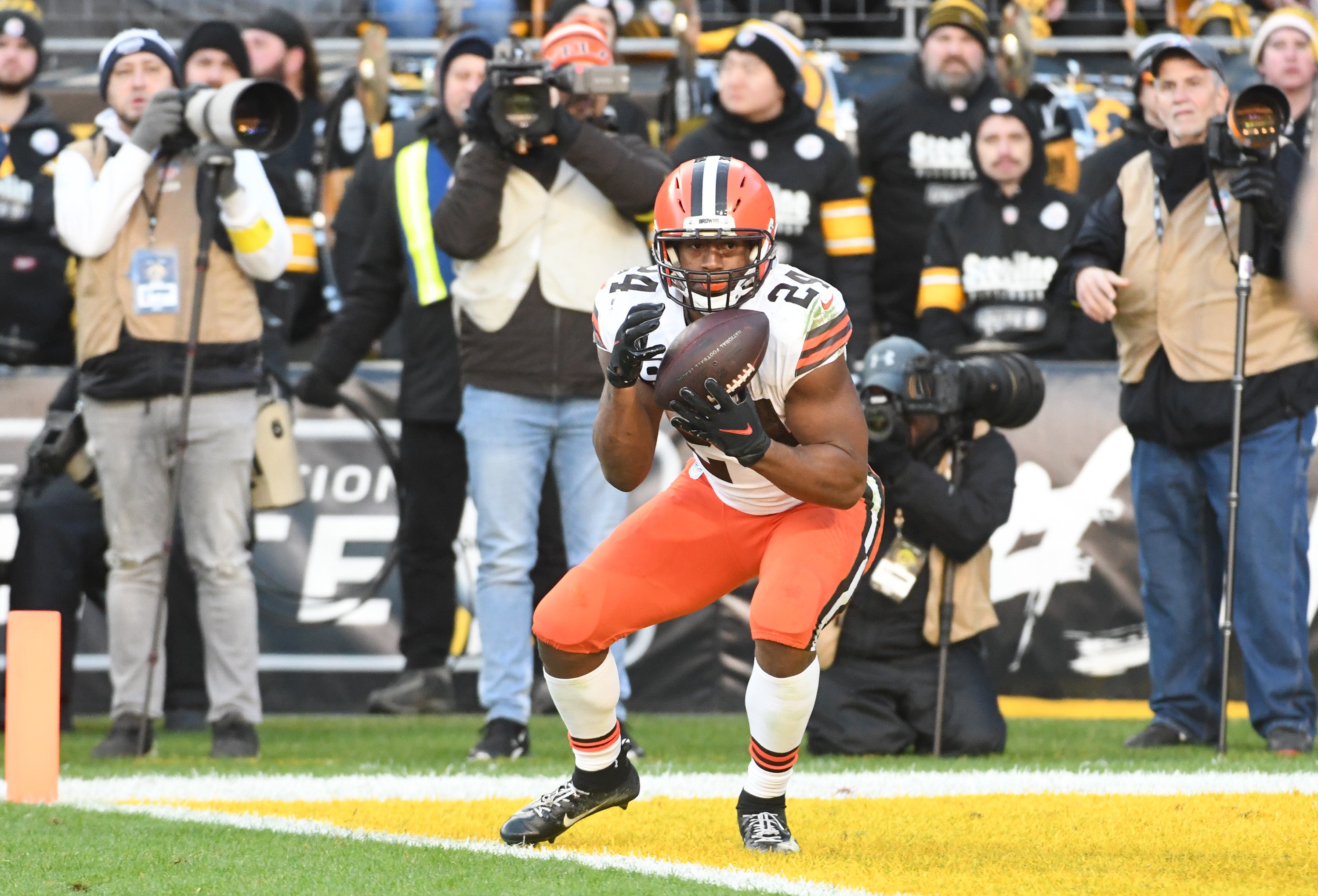 Jan 8, 2023; Pittsburgh, Pennsylvania, USA; Cleveland Browns running back Nick Chubb (24) scores a touchdown against the Pittsburgh Steelers during the fourth quarter at Acrisure Stadium.