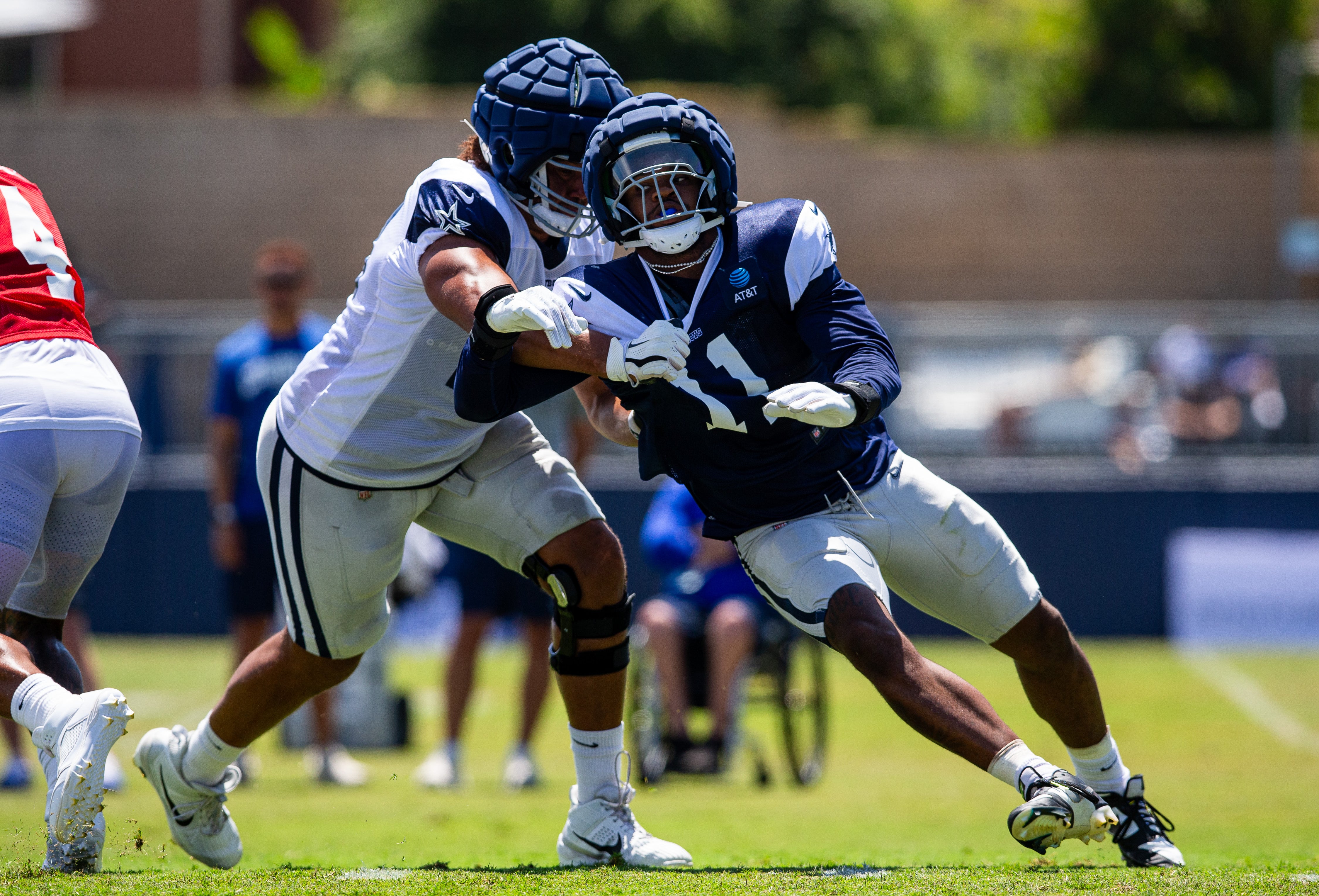Dallas Cowboys superstar Micah Parsons rushing the passer in training camp.