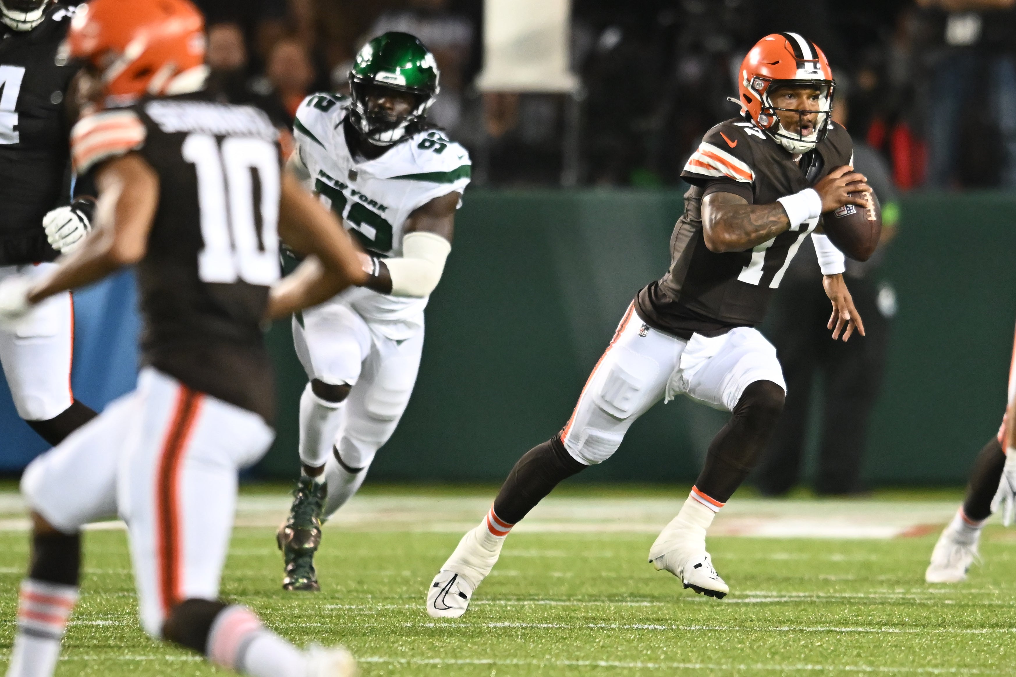 Caption:Aug 3, 2023; Canton, Ohio, USA; Cleveland Browns quarterback Dorian Thompson-Robinson (17) scrambles during the second half against the New York Jets at Tom Benson Hall of Fame Stadium.