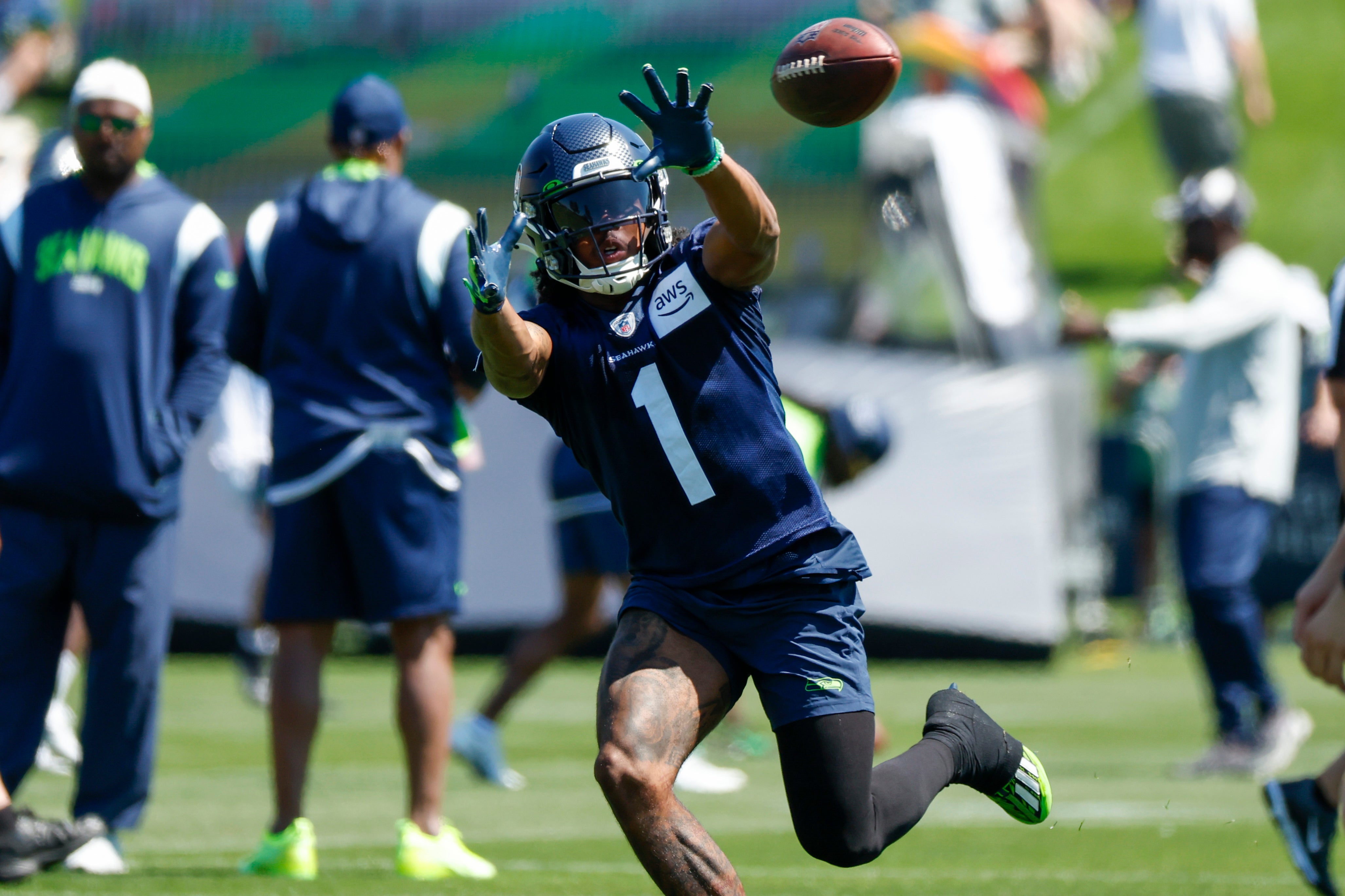 Jul 28, 2023; Renton, WA, USA; Seattle Seahawks wide receiver Dee Eskridge (1) catches a pass during training camp practice at the Virginia Mason Athletic Center. Mandatory Credit: Joe Nicholson-USA TODAY Sports