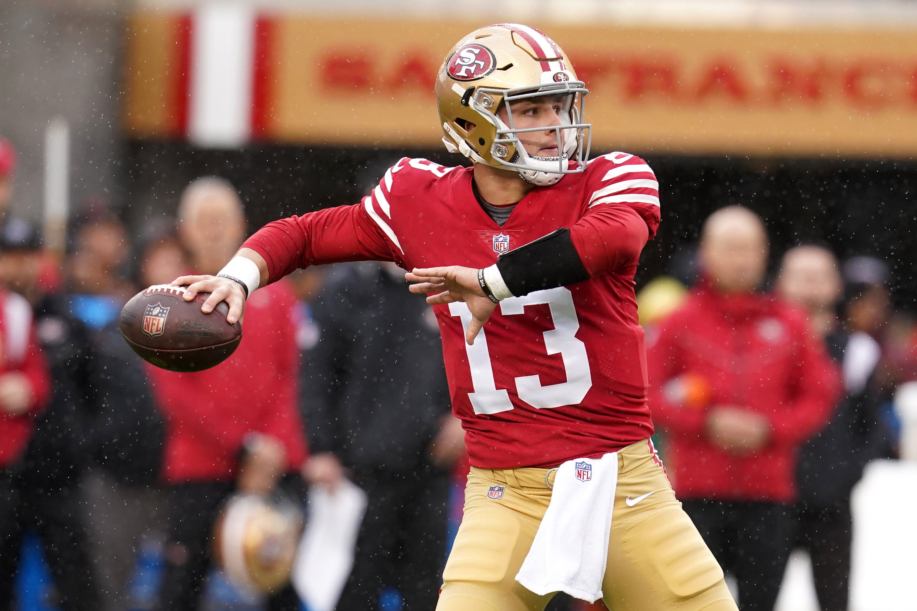 Jan 14, 2023; Santa Clara, California, USA; San Francisco 49ers quarterback Brock Purdy (13) looks to pass in the first quarter during a wild card game against the Seattle Seahawks at Levi's Stadium. Mandatory Credit: Cary Edmondson-USA TODAY Sports