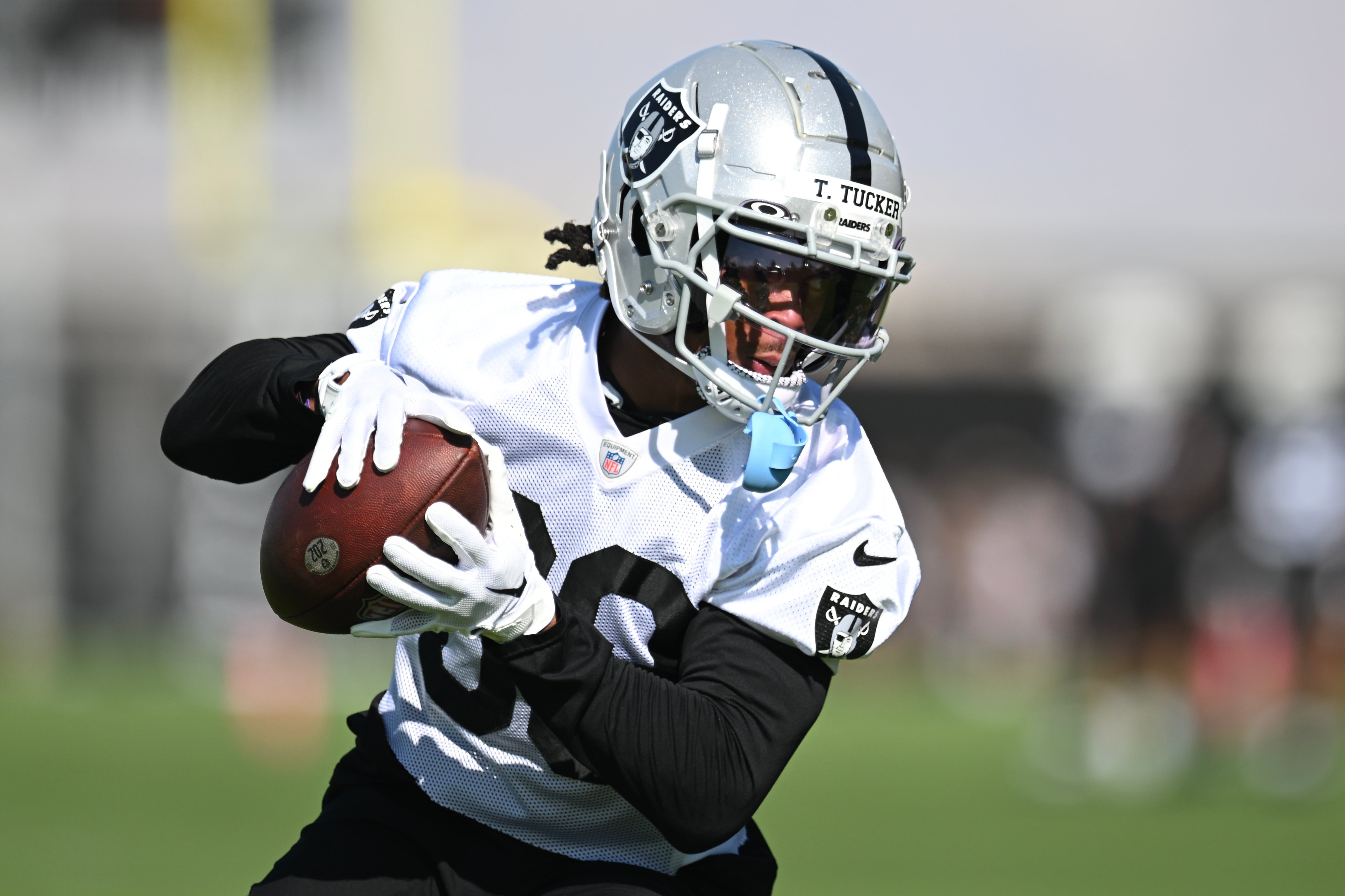 Raiders receiver Tre Tucker catching the ball at training camp