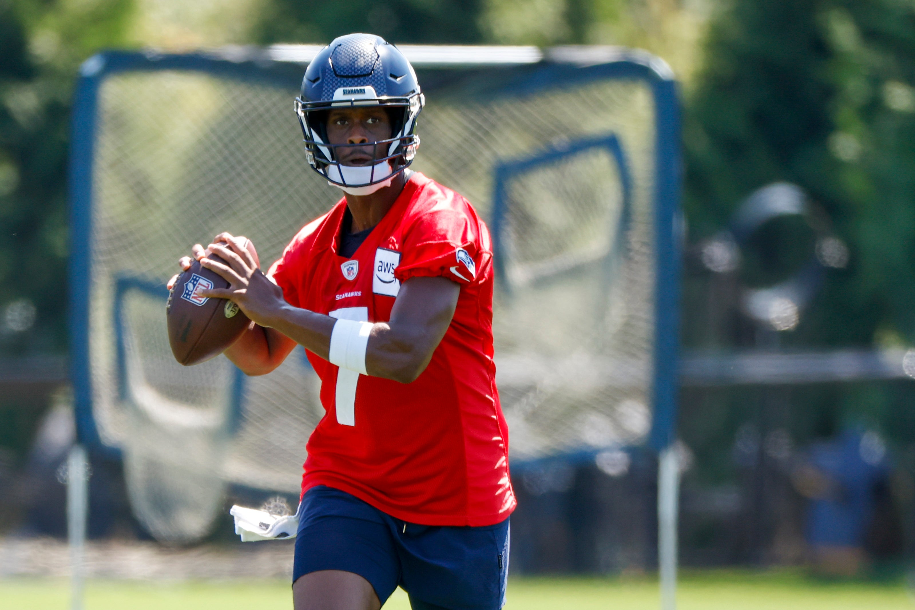 Jul 28, 2023; Renton, WA, USA; Seattle Seahawks quarterback Geno Smith (7) throws during training camp practice at the Virginia Mason Athletic Center. Mandatory Credit: Joe Nicholson-USA TODAY Sports