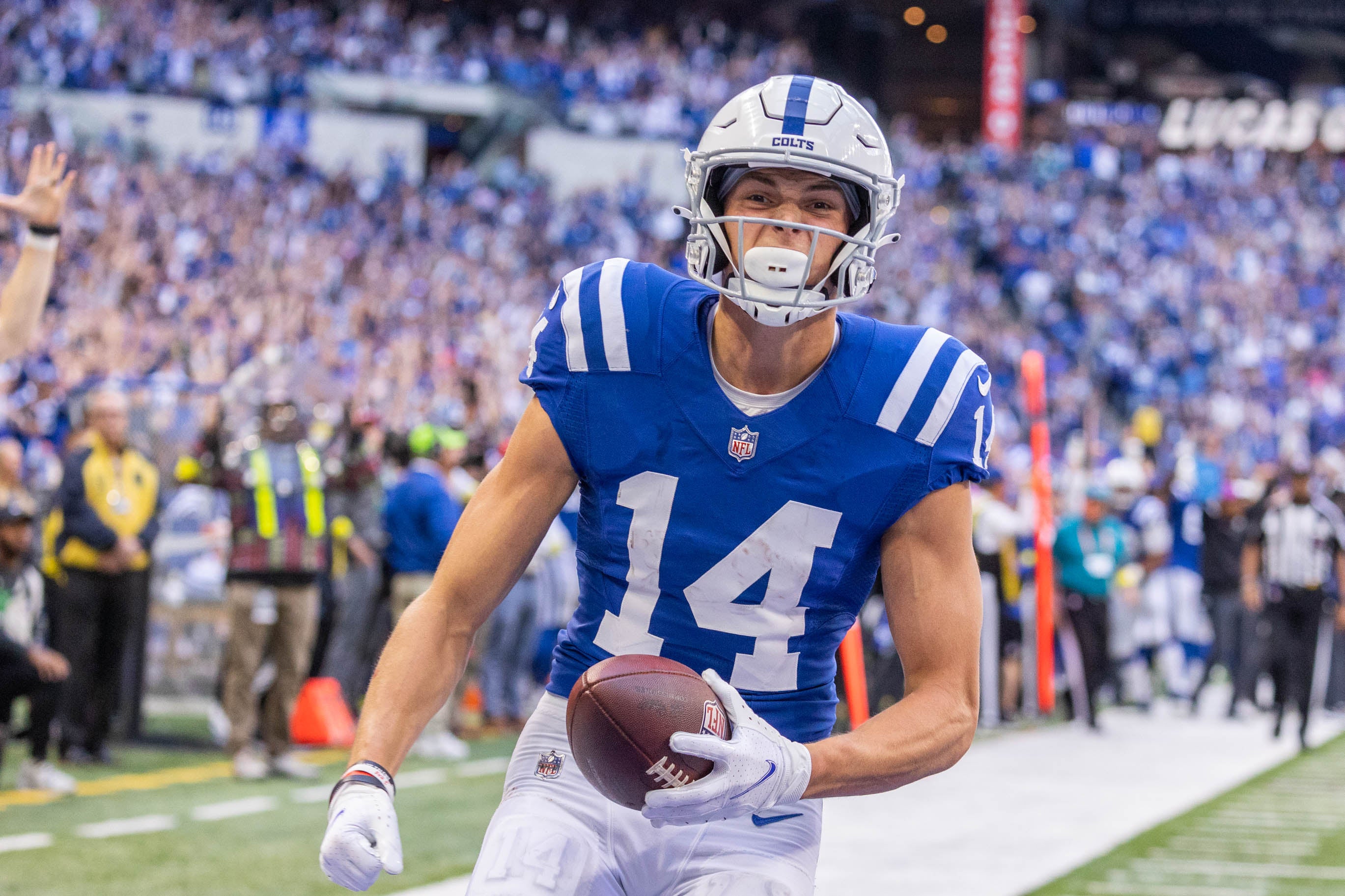 Oct 16, 2022; Indianapolis, Indiana, USA; Indianapolis Colts wide receiver Alec Pierce (14) celebrates his winning touchdown in the second half against the Jacksonville Jaguars at Lucas Oil Stadium.