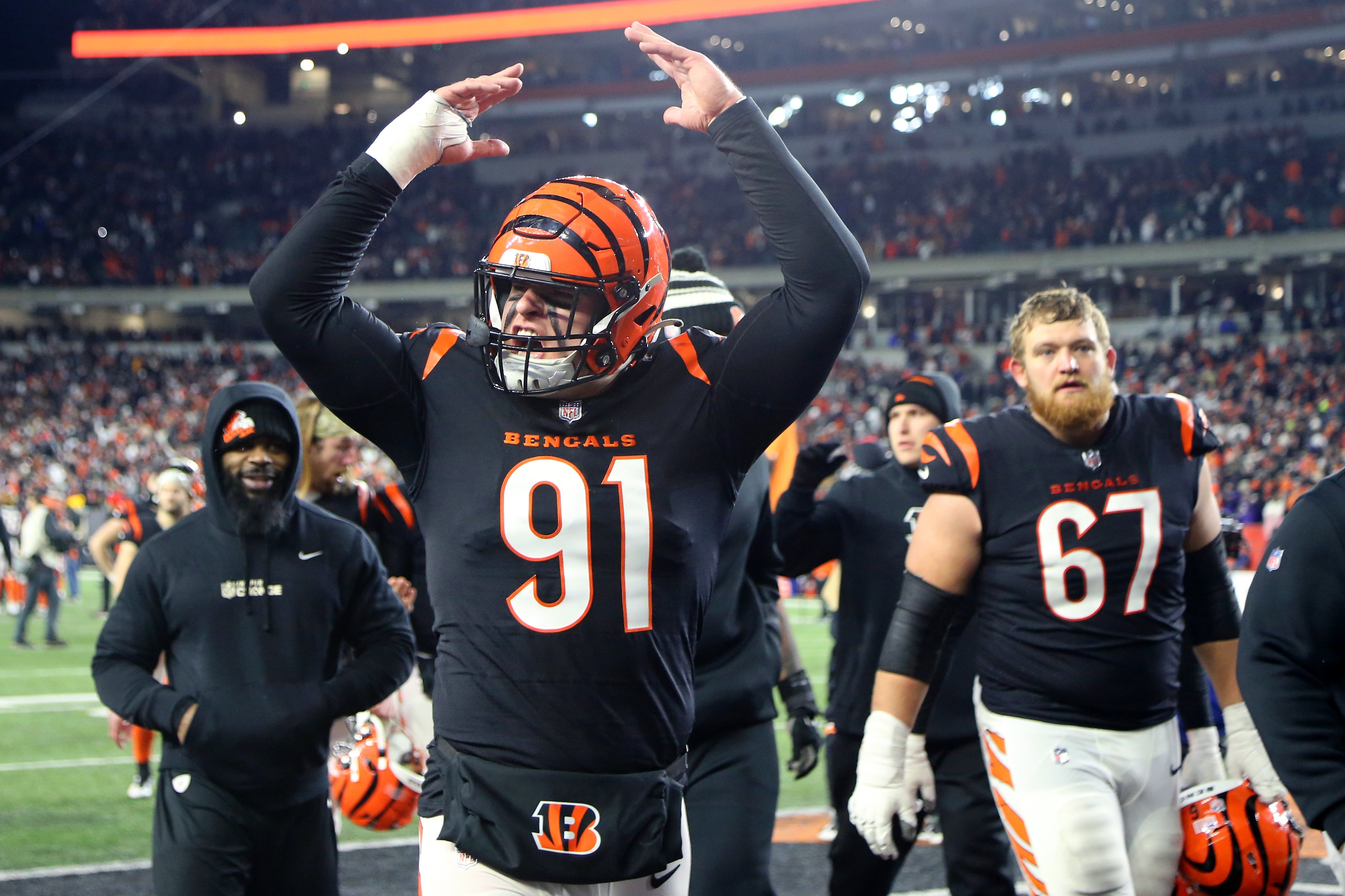 Jan 15, 2023; Cincinnati, Ohio, USA; Cincinnati Bengals defensive end Trey Hendrickson (91) celebrates after defeating the Baltimore Ravens in a wild card game at Paycor Stadium. Mandatory Credit: Joseph Maiorana-USA TODAY Sports