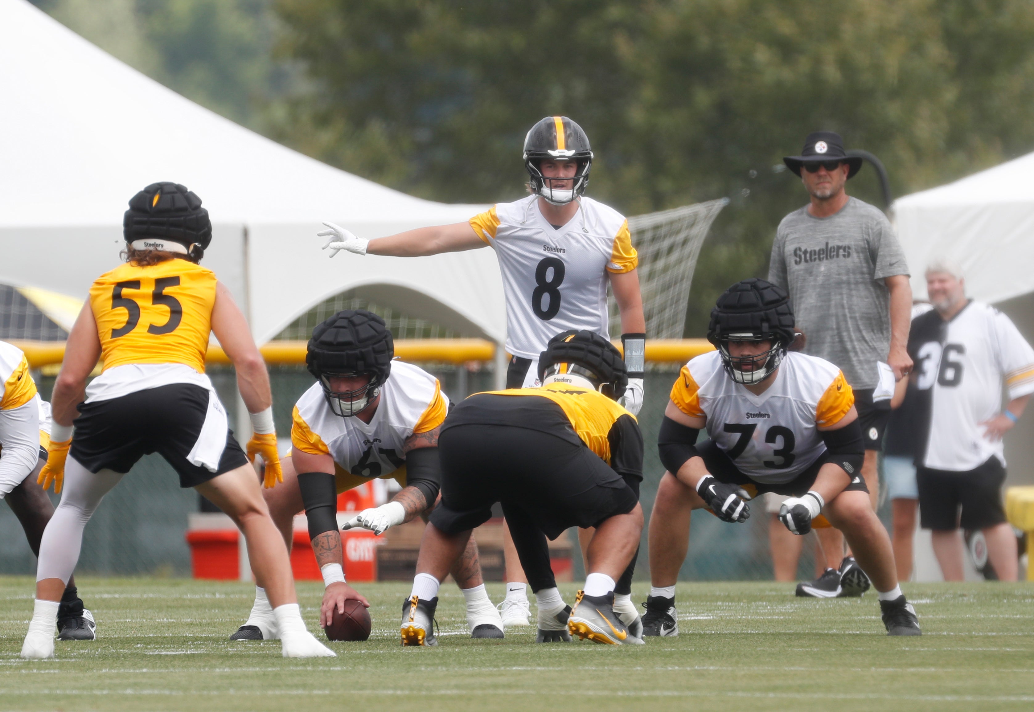 Jul 27, 2023; Latrobe, PA, USA; Pittsburgh Steelers quarterback Kenny Pickett (8) at the line of scrimmage in drills during training camp at Saint Vincent College. Mandatory Credit: Charles LeClaire-USA TODAY Sports