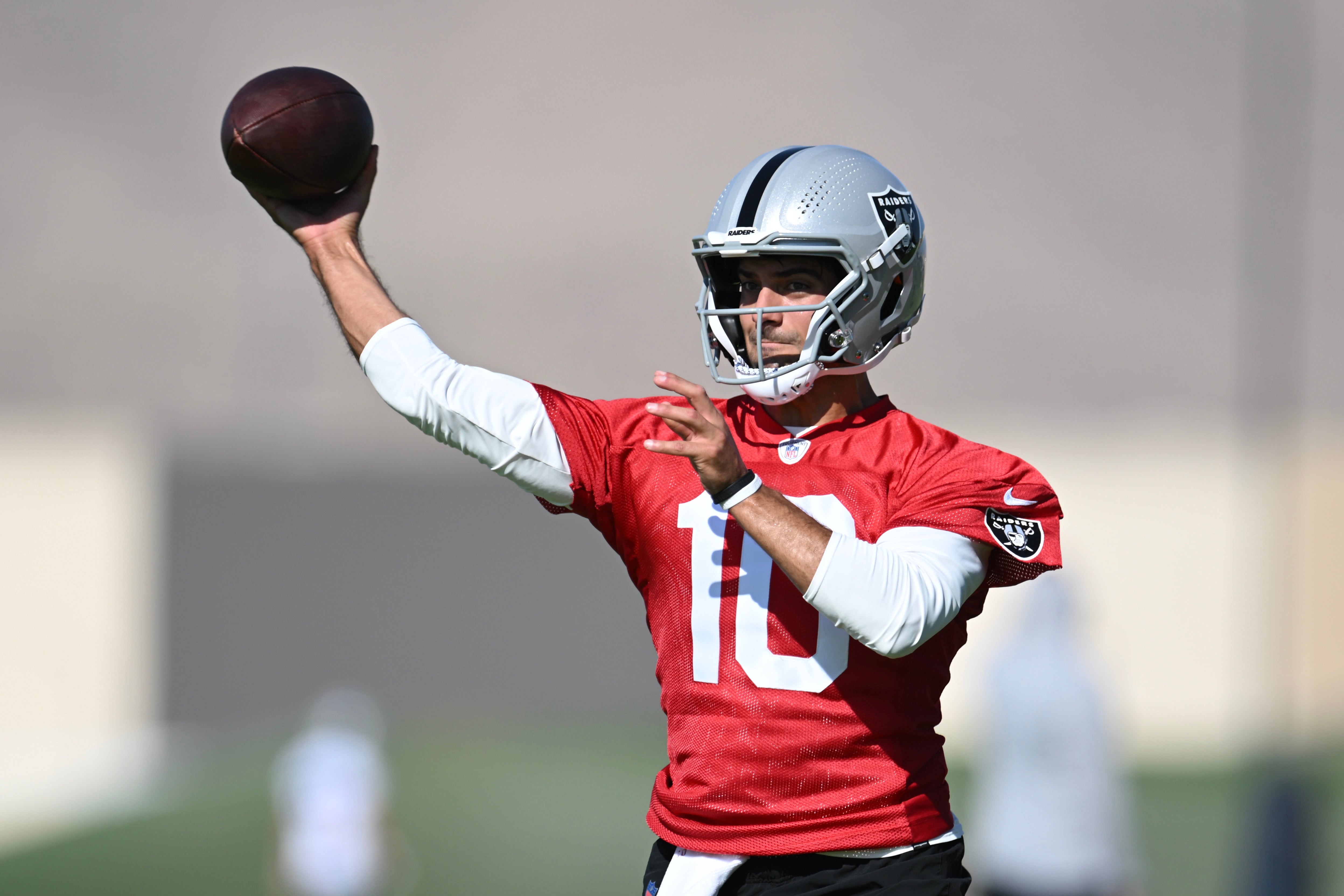 Jul 26, 2023; Las Vegas, Nevada, USA; Las Vegas Raiders quarterback Jimmy Garoppolo (10) during training camp at the Intermountain Health Performance Center. Mandatory Credit: Candice Ward-USA TODAY Sports