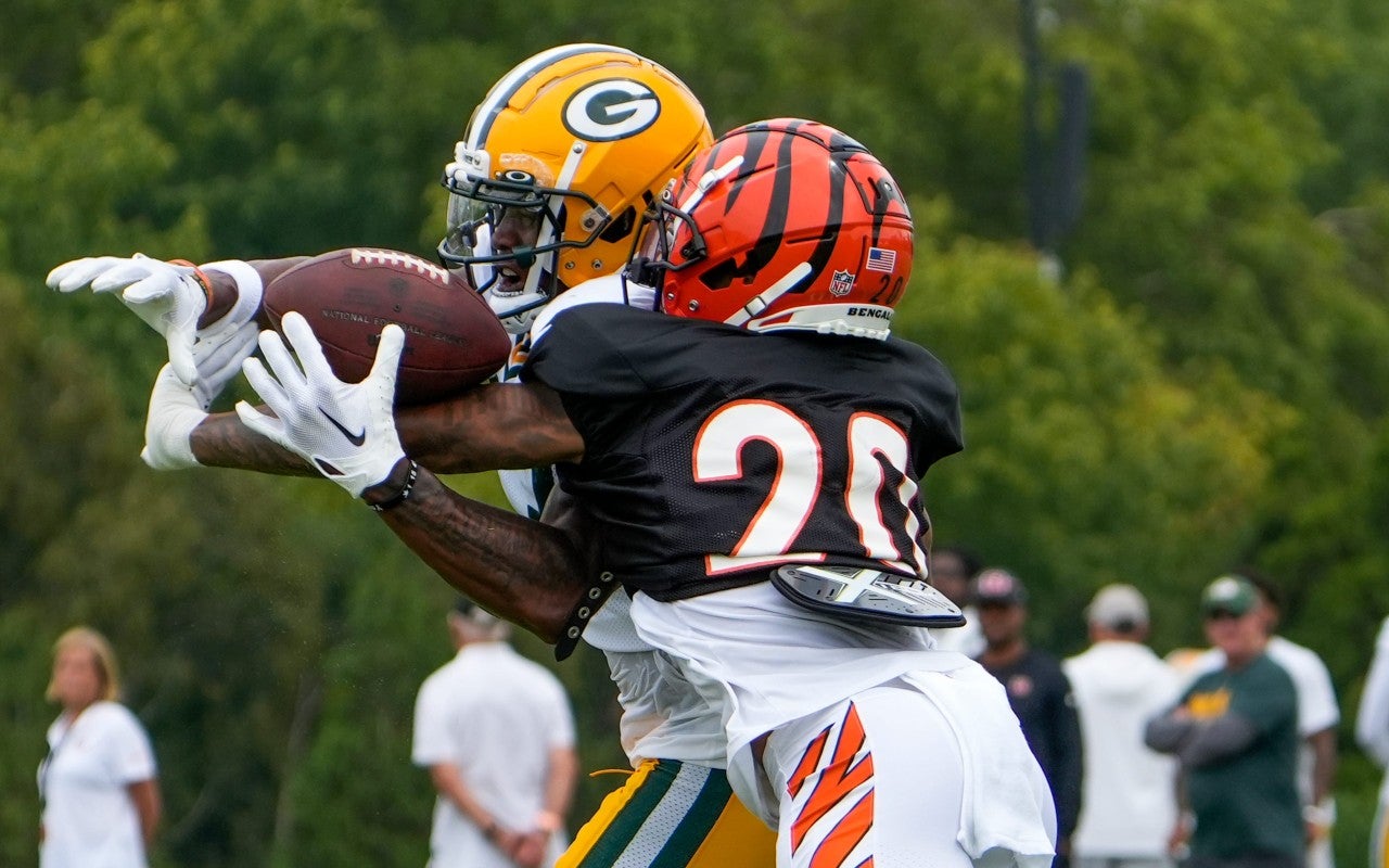 Cincinnati Bengals cornerback DJ Turner II (20) intercepts the ball from a Green Bay Packer player during a joint practice between the Green Bay Packers and the Cincinnati Bengals, Wednesday, Aug. 9, 2023, at the practice fields next to Paycor Stadium in Cincinnati. Mandatory credit © Carter Skaggs/The Enquirer / USA TODAY NETWORK