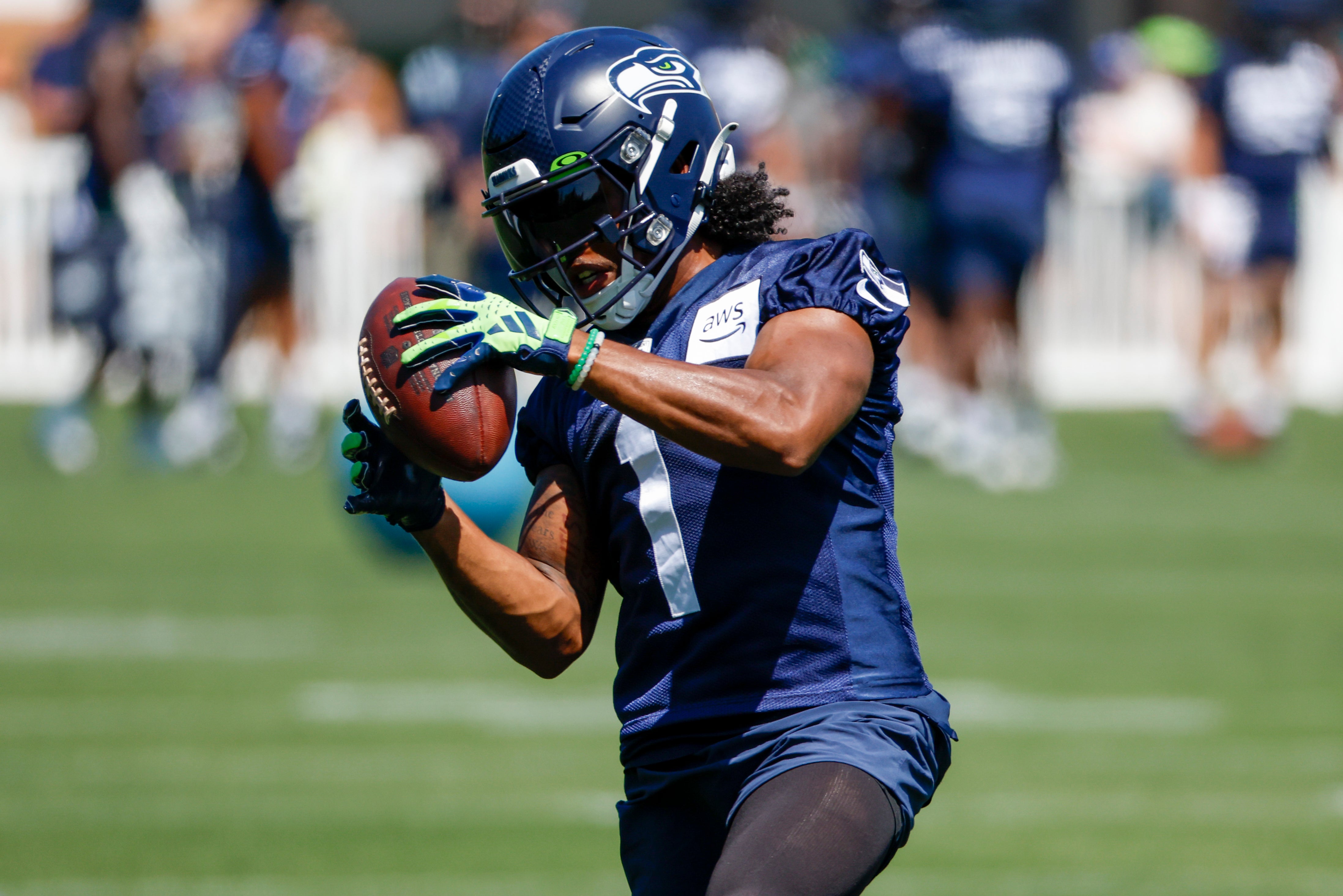 Jul 28, 2023; Renton, WA, USA; Seattle Seahawks wide receiver Dee Eskridge (1) catches a pass during training camp practice at the Virginia Mason Athletic Center. Mandatory Credit: Joe Nicholson-USA TODAY Sports
