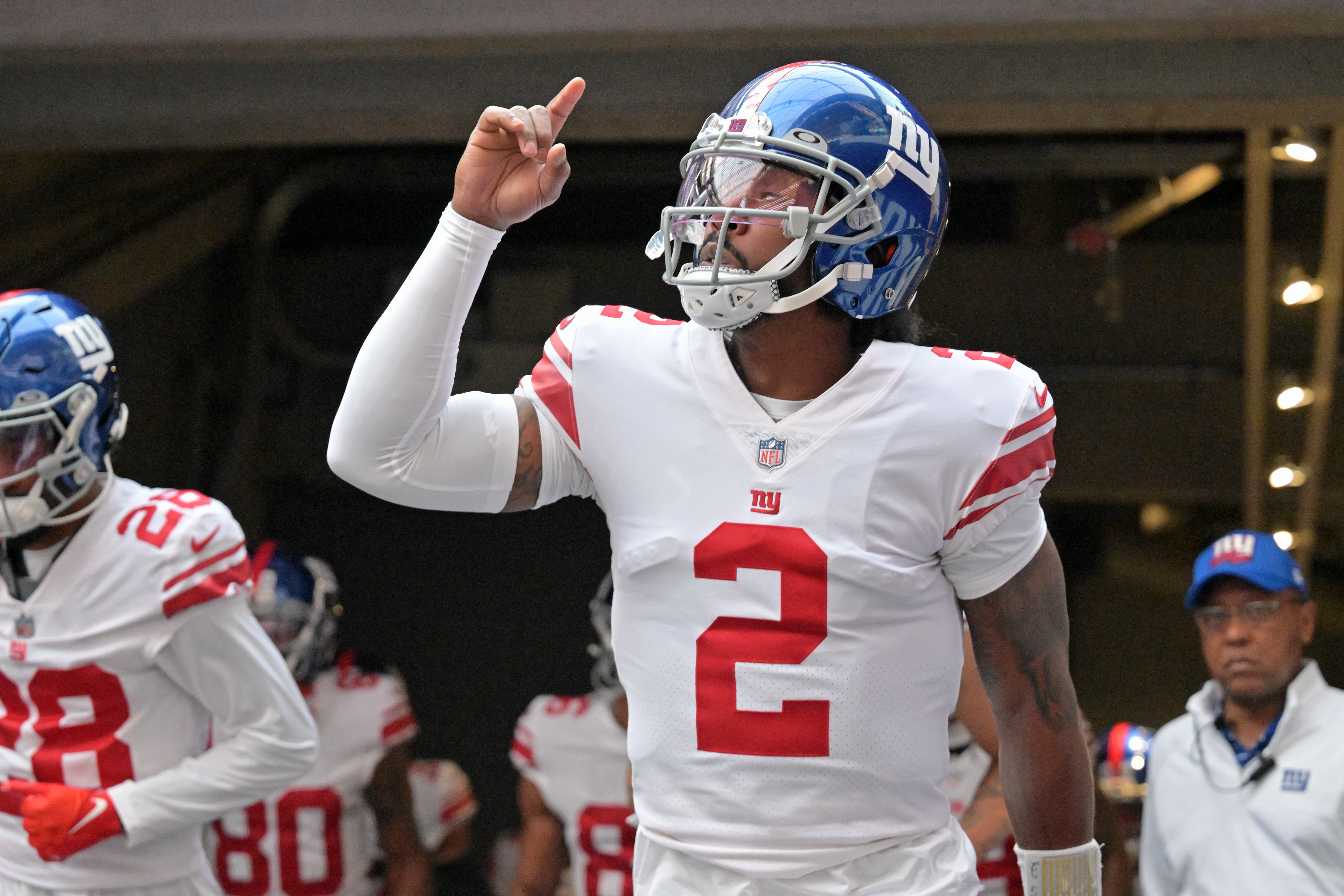 New York Giants QB Tyron Taylor gestures before before running onto the field.  Jeffrey Becker-USA TODAY Sports