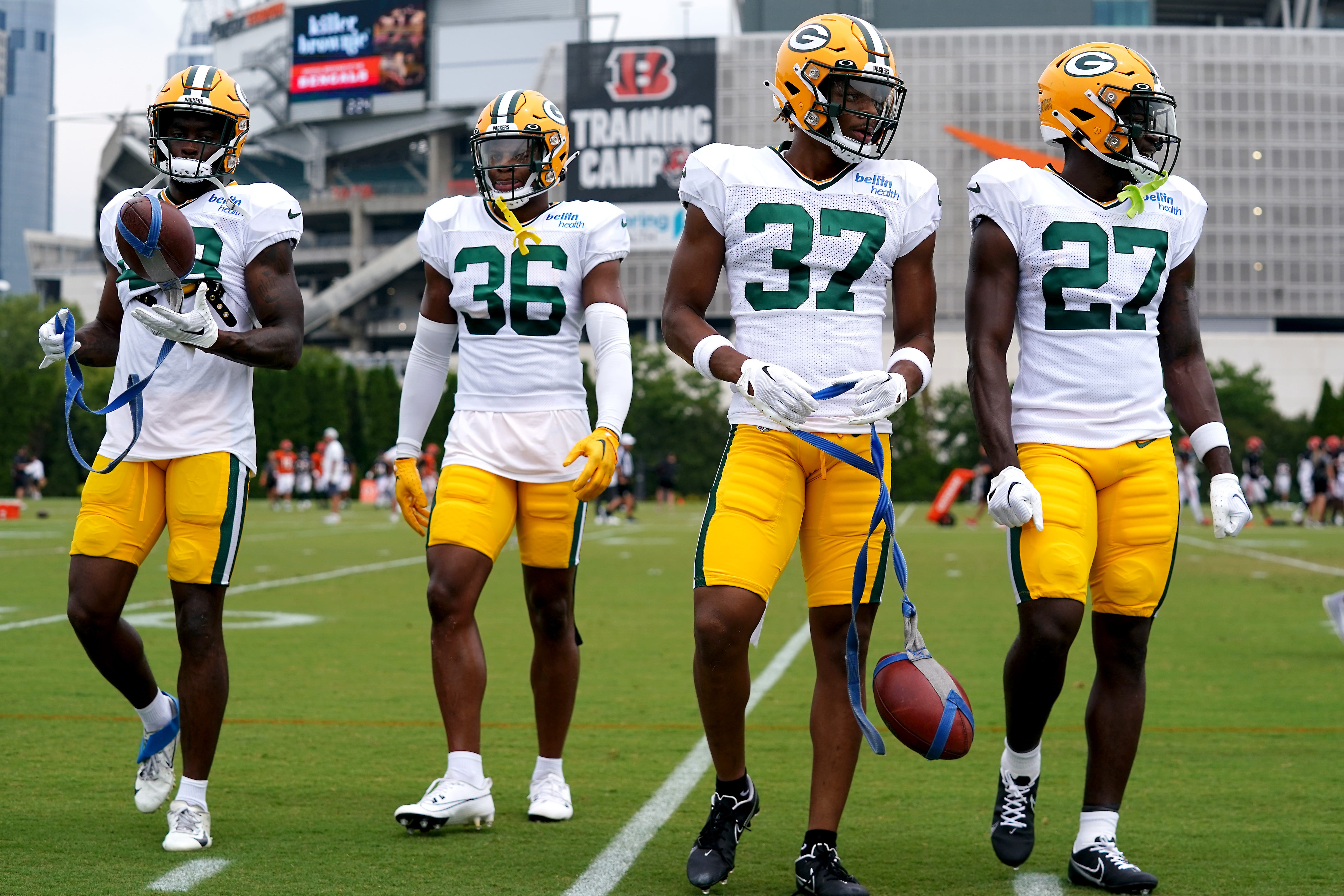 Green Bay Packers wide receiver Malik Heath (18), Green Bay Packers safety Anthony Johnson Jr. (36), Green Bay Packers cornerback Carrington Valentine (37) and Green Bay Packers running back Patrick Taylor (27) participate in drills during a joint practice between the Green Bay Packers and the Cincinnati Bengals, Wednesday, Aug. 9, 2023, at the practice fields next to Paycor Stadium in Cincinnati.  Kareem Elgazzar/The Enquirer / USA TODAY NETWORK