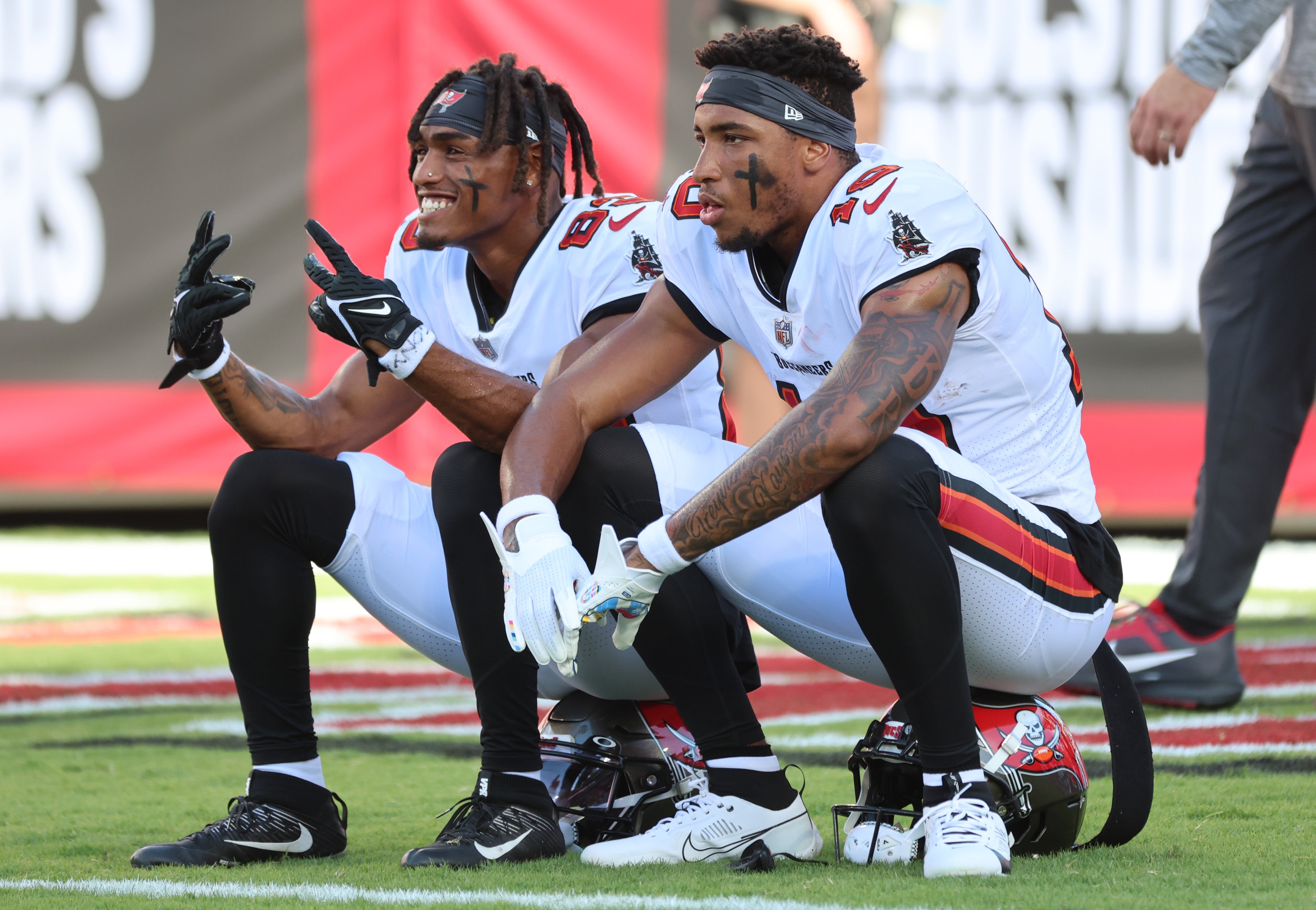 Aug 11, 2023; Tampa, Florida, USA; Tampa Bay Buccaneers wide receiver Deven Thompkins (83) and wide receiver Trey Palmer (10) work out against the Pittsburgh Steelers prior to the game at Raymond James Stadium. Mandatory Credit: Kim Klement Neitzel-USA TODAY Sports