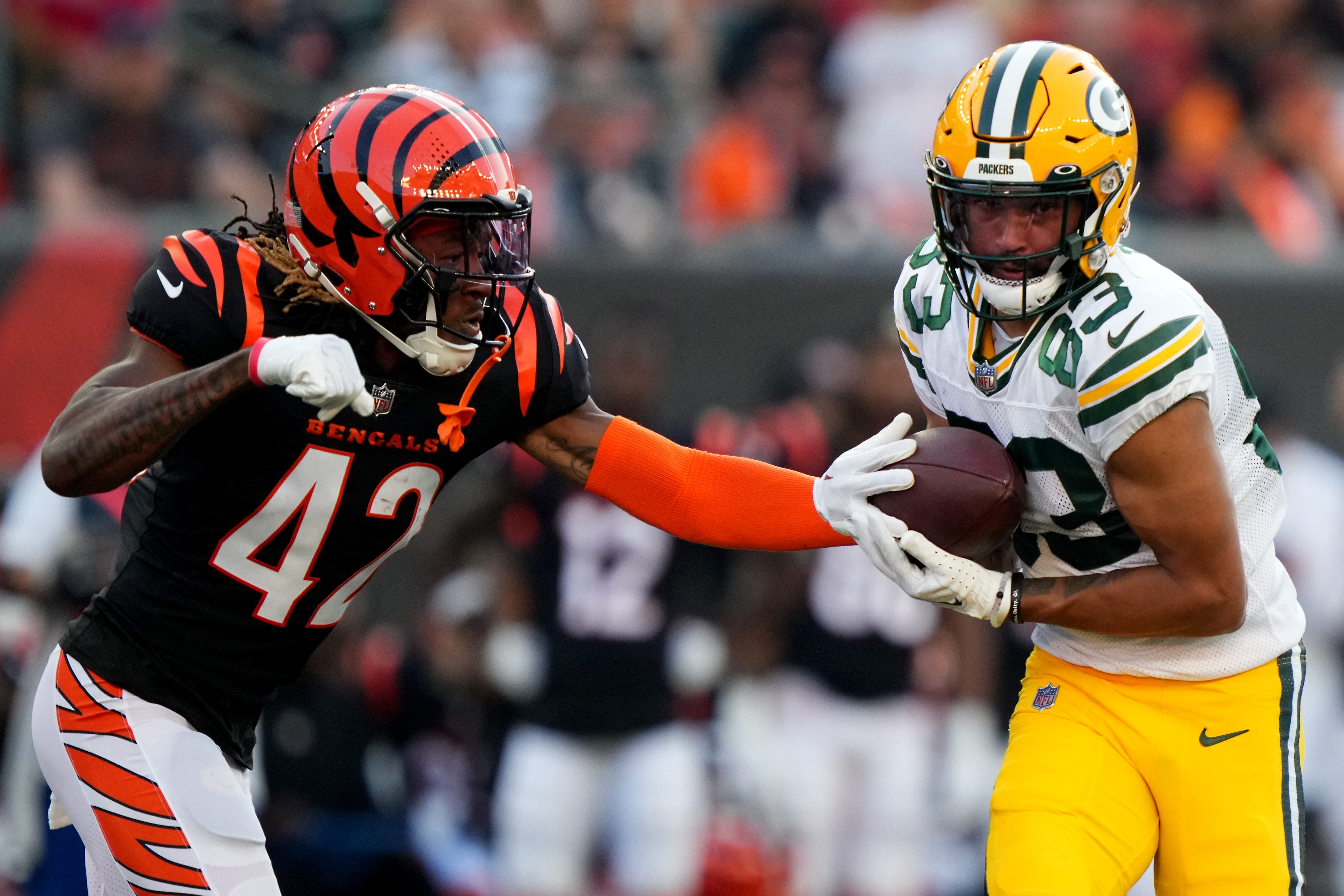 Green Bay Packers wide receiver Samori Toure (83) competes a catch as Cincinnati Bengals cornerback Allan George (42) defends in the second quarter during a Week 1 NFL preseason game between the Green Bay Packers and the Cincinnati Bengals, Friday, Aug. 11, 2023, at Paycor Stadium in Cincinnati Kareem Elgazzar/The Enquirer / USA TODAY NETWORK