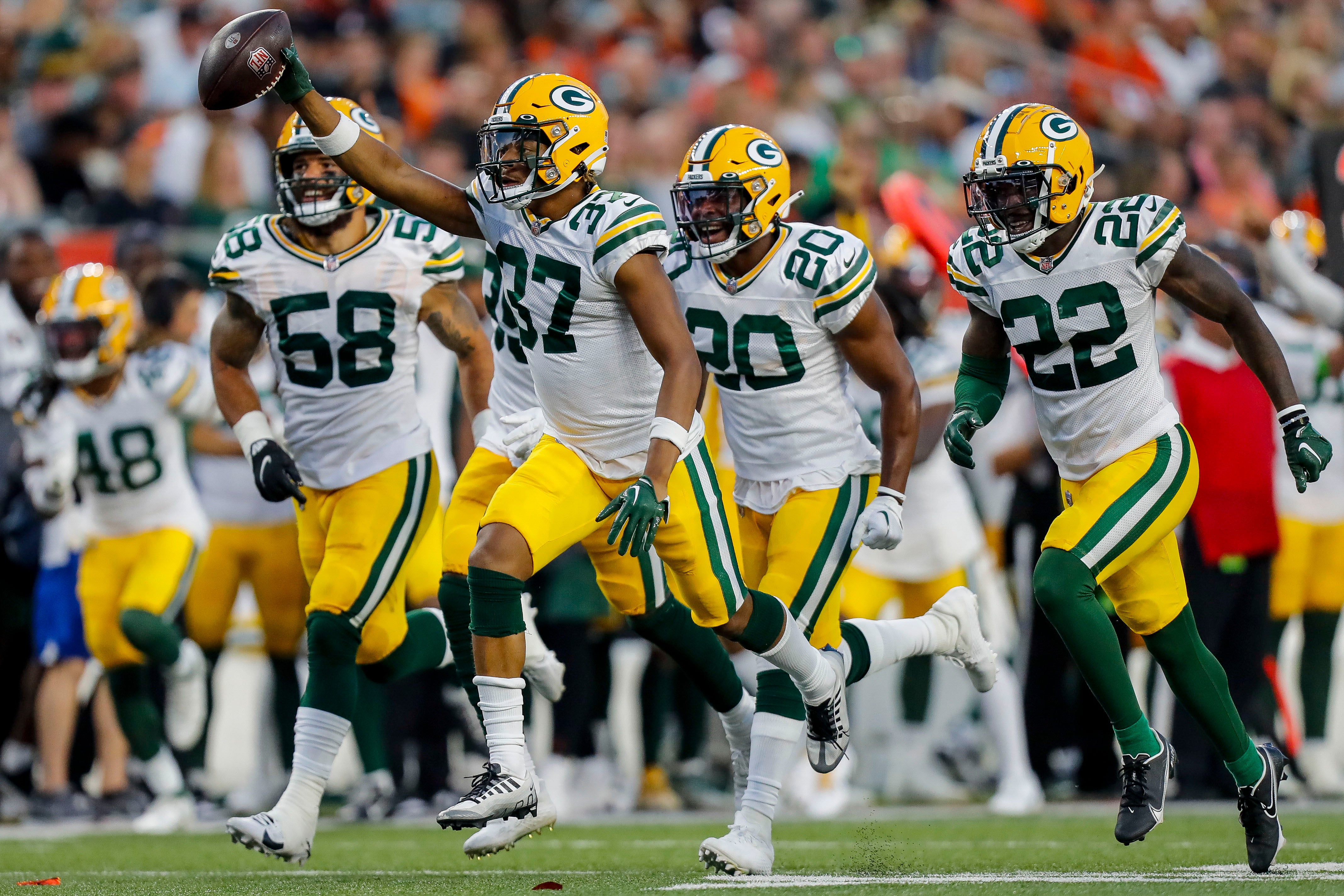 Aug 11, 2023; Cincinnati, Ohio, USA; Green Bay Packers cornerback Carrington Valentine (37) reacts after an interception against the Cincinnati Bengals in the first half at Paycor Stadium. Mandatory Credit: Katie Stratman-USA TODAY Sports