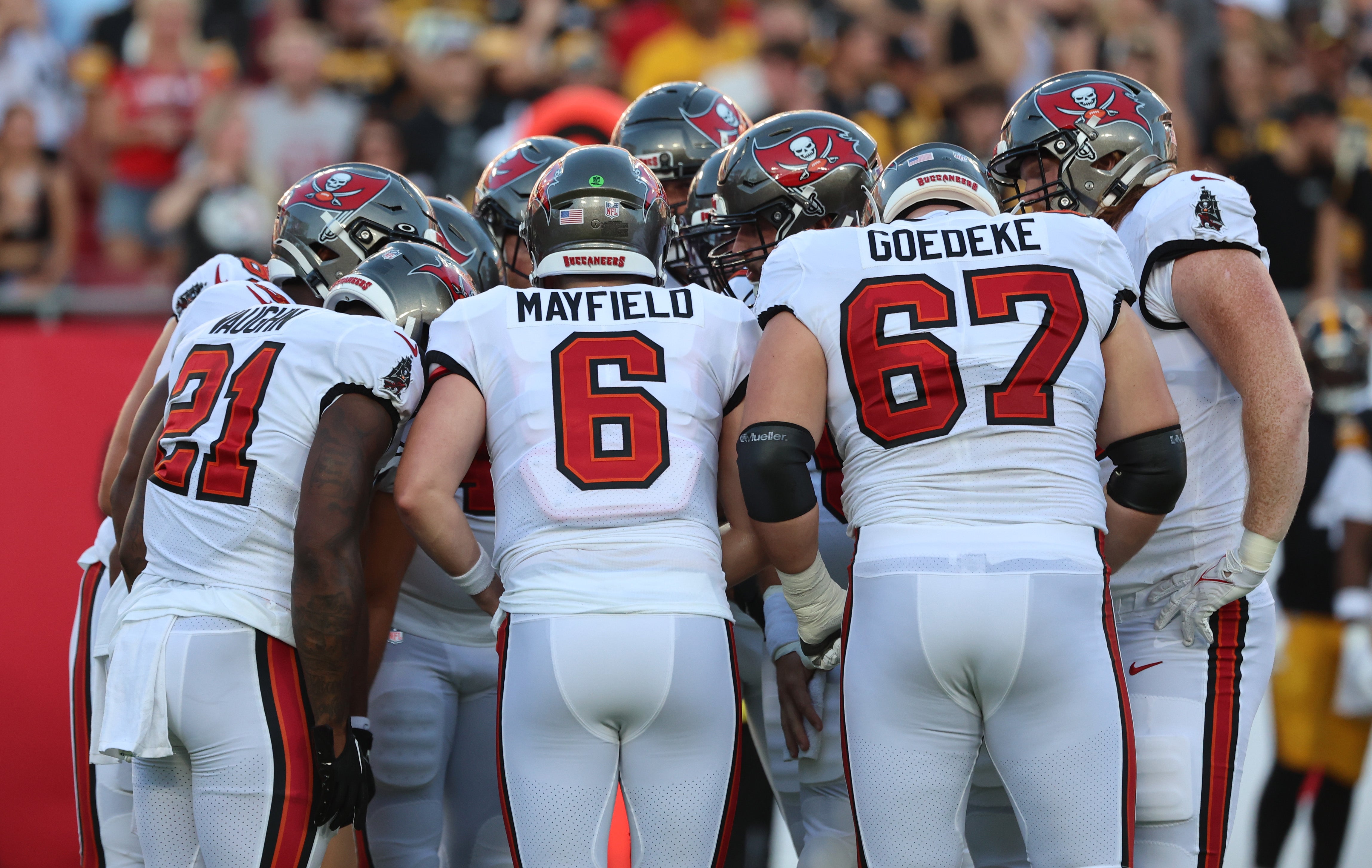 Aug 11, 2023; Tampa, Florida, USA; Tampa Bay Buccaneers quarterback Baker Mayfield (6) huddles with teammates during the first quarter against the Pittsburgh Steelers at Raymond James Stadium. Mandatory Credit: Kim Klement Neitzel-USA TODAY Sports