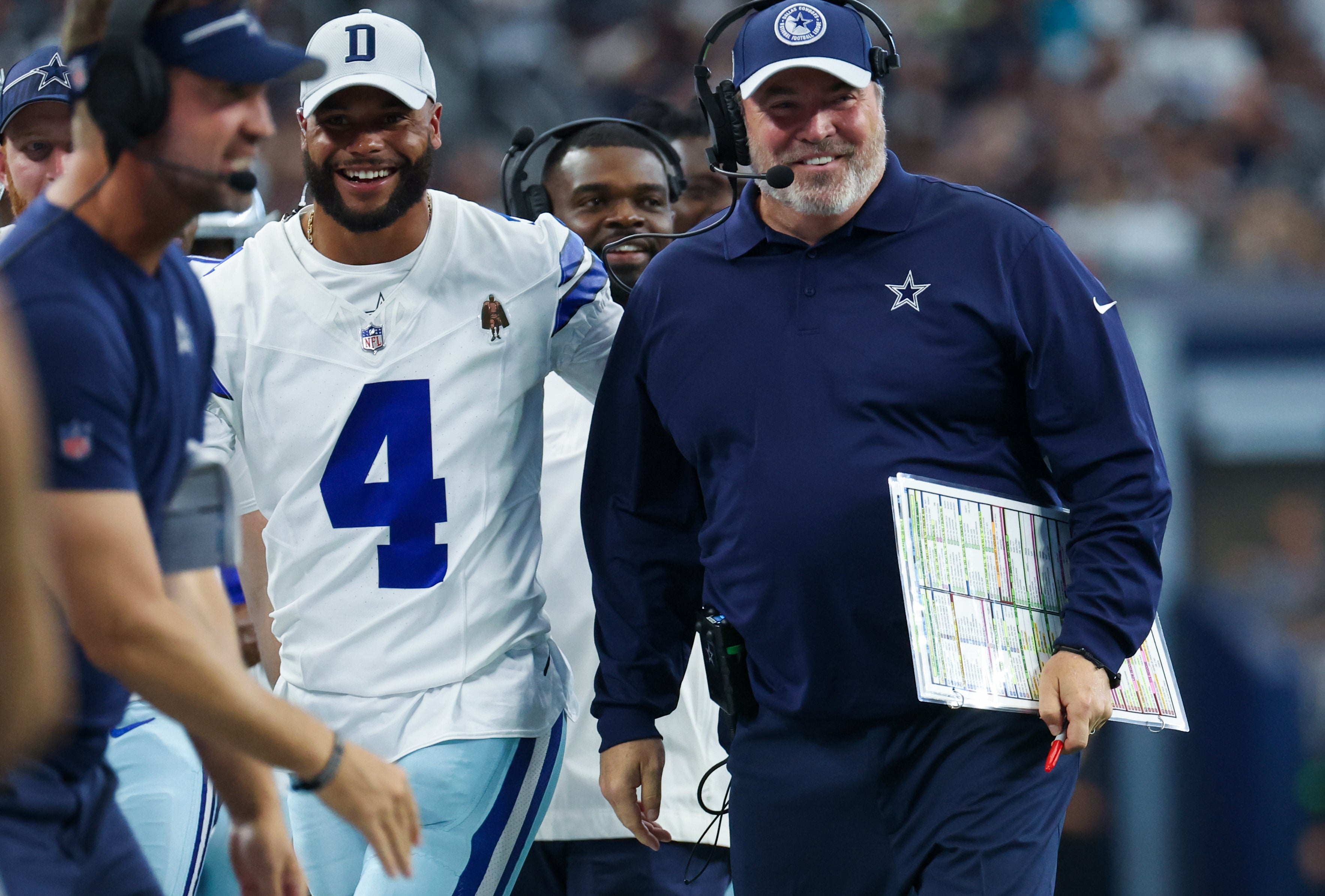 Dallas Cowboys head coach Mike McCarthy laughs with Dallas Cowboys quarterback Dak Prescott (4) after a touchdown during the second quarter against the Jacksonville Jaguars at AT&T Stadium / Kevin Jairaj-USA TODAY Sports