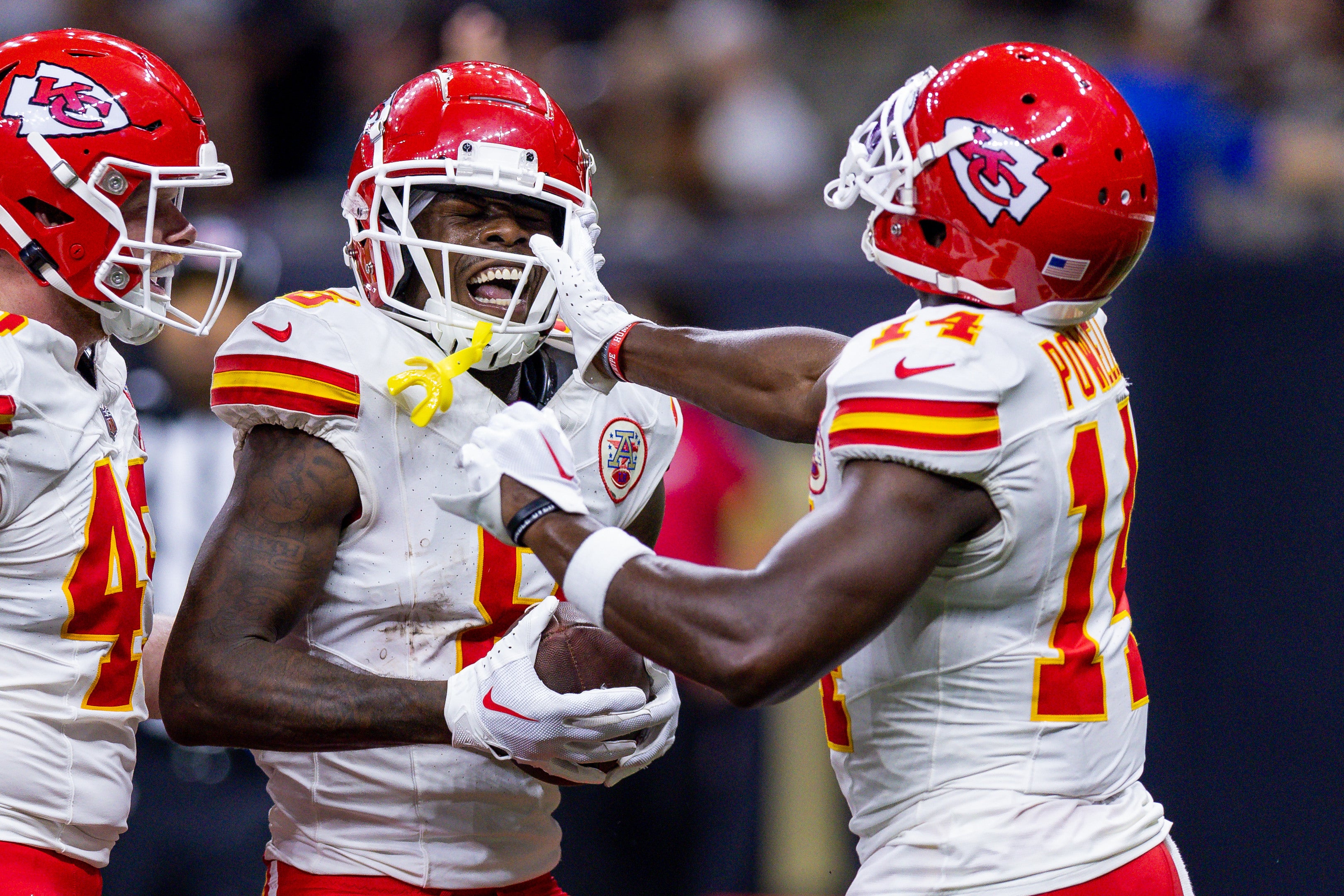 Aug 13, 2023; New Orleans, Louisiana, USA; Kansas City Chiefs wide receiver Cornell Powell (14) and wide receiver Justyn Ross (8) celebrate a touchdown against the New Orleans Saints during the second half at the Caesars Superdome. Mandatory Credit: Stephen Lew-USA TODAY Sports