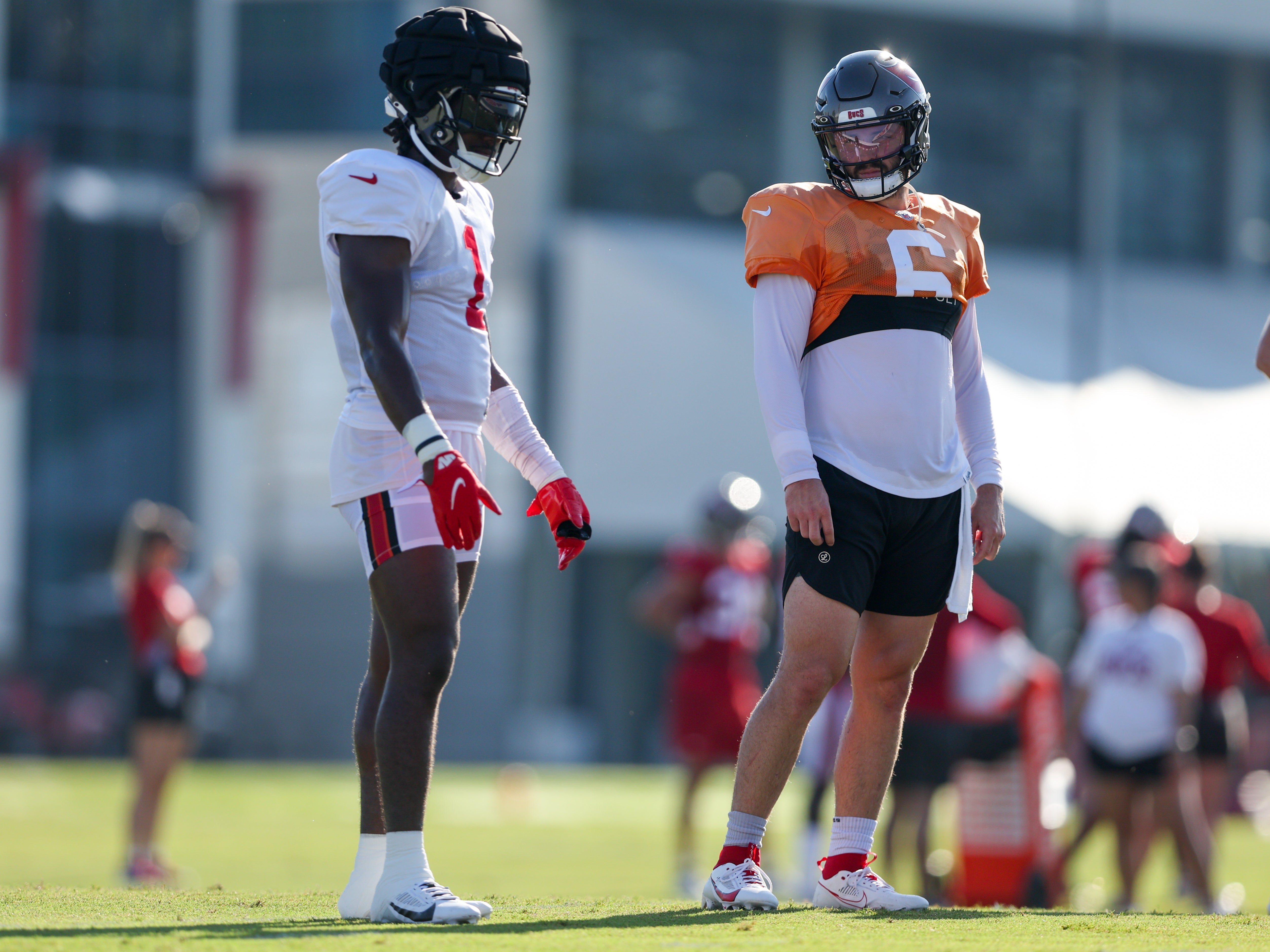 Aug 8, 2023; Tampa, FL, USA; Tampa Bay Buccaneers quarterback Baker Mayfield (6) and running back Rachaad White (1) participates in training camp at AdventHealth Training Center. Mandatory Credit: Nathan Ray Seebeck-USA TODAY Sports