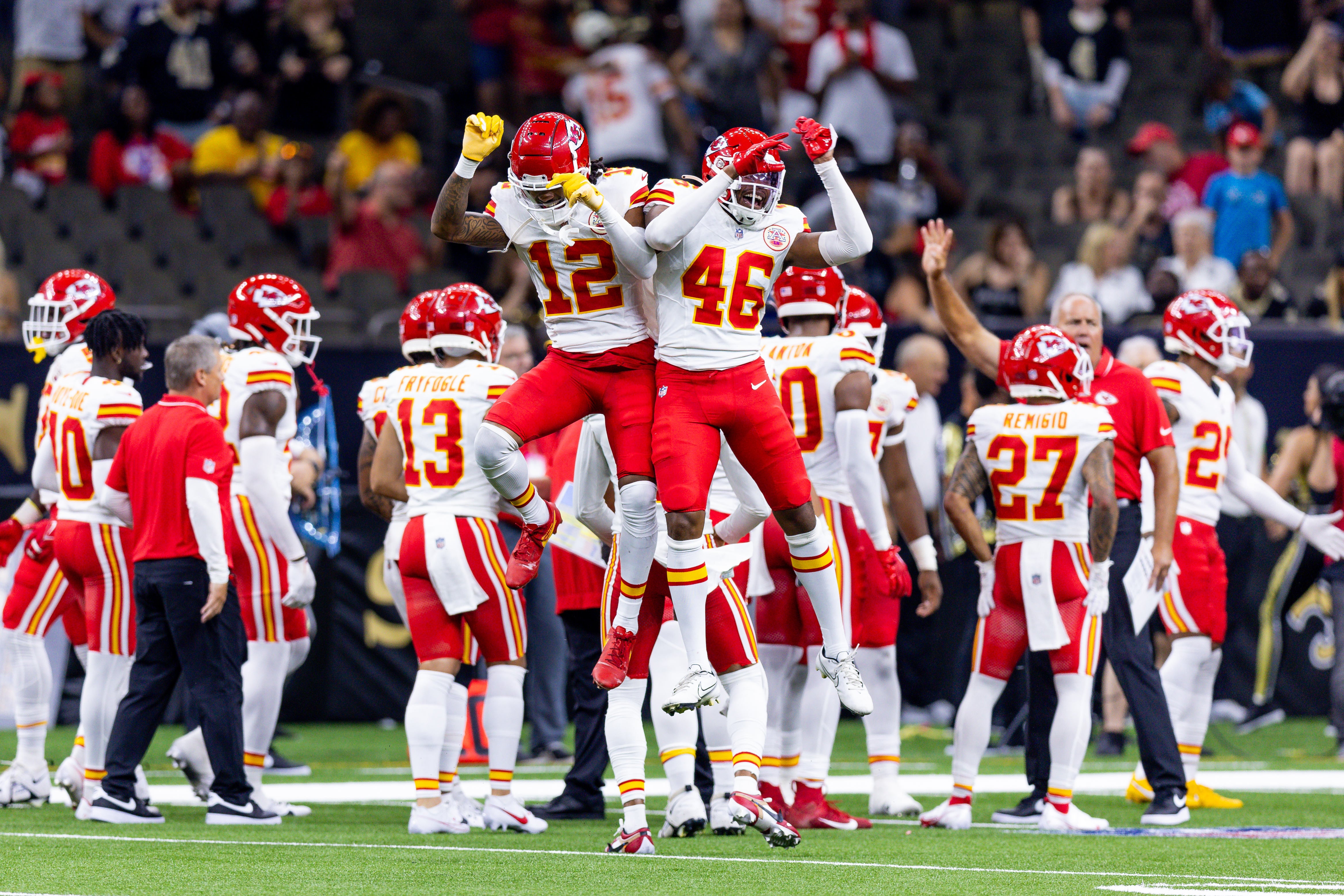 Aug 13, 2023; New Orleans, Louisiana, USA; Kansas City Chiefs safety Isaiah Norman (46) and cornerback Kahlef Hailassie (12) celebrate an interception against the New Orleans Saints during the second half at the Caesars Superdome. Mandatory Credit: Stephen Lew-USA TODAY Sports