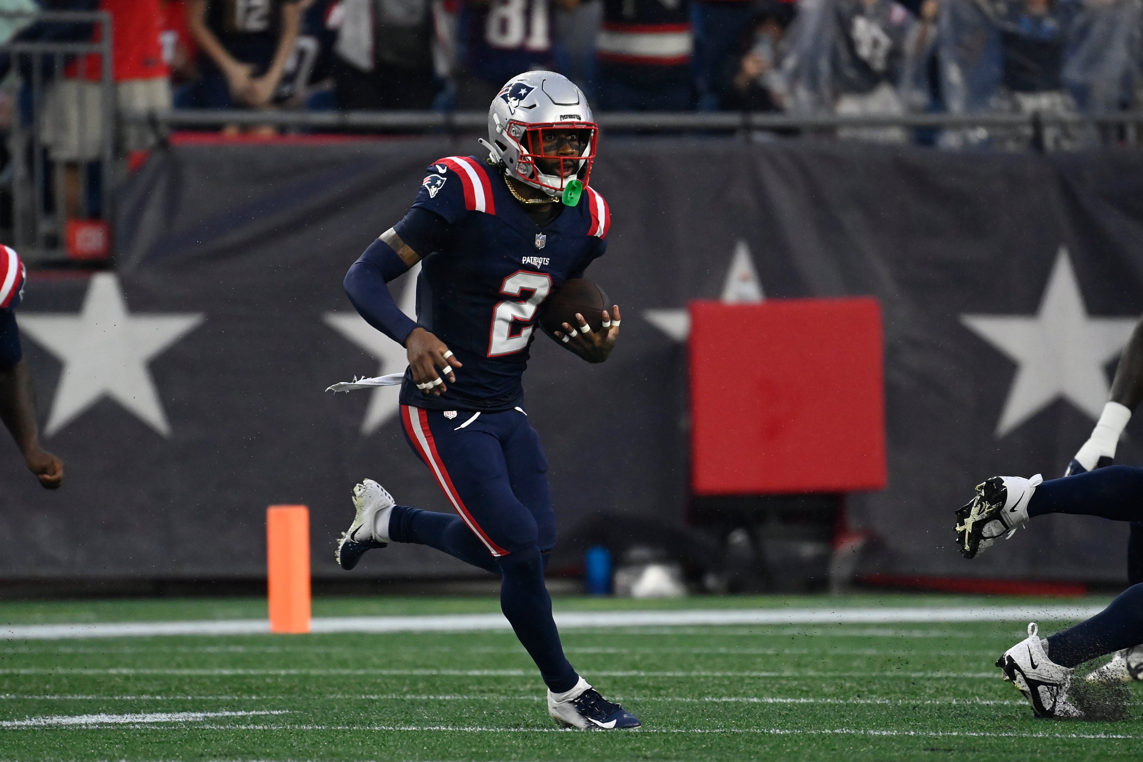 Aug 10, 2023; Foxborough, Massachusetts, USA; New England Patriots cornerback Jalen Mills (2) runs after intercepting the ball during the first half against the Houston Texans at Gillette Stadium. Mandatory Credit