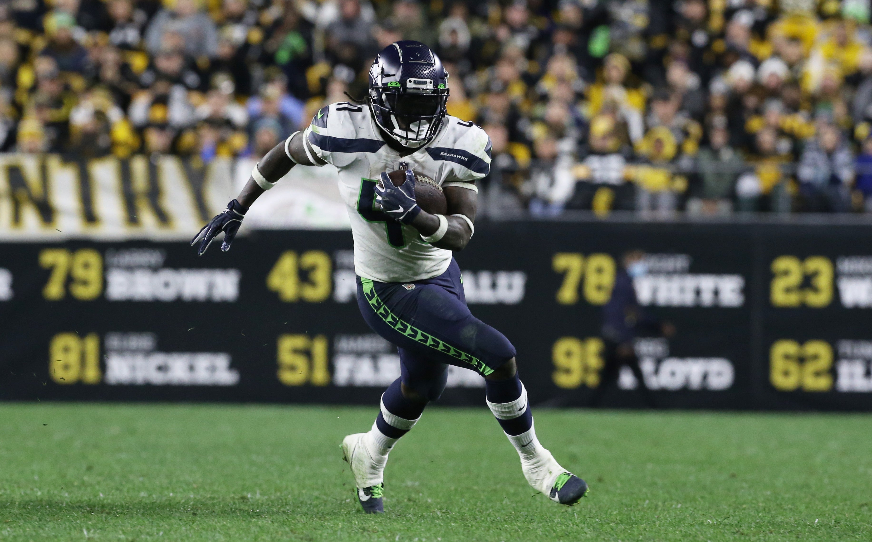 Oct 17, 2021; Pittsburgh, Pennsylvania, USA; Seattle Seahawks running back Alex Collins (41) carries the ball against the Pittsburgh Steelers during the fourth quarter at Heinz Field. Mandatory Credit: Charles LeClaire-USA TODAY Sports