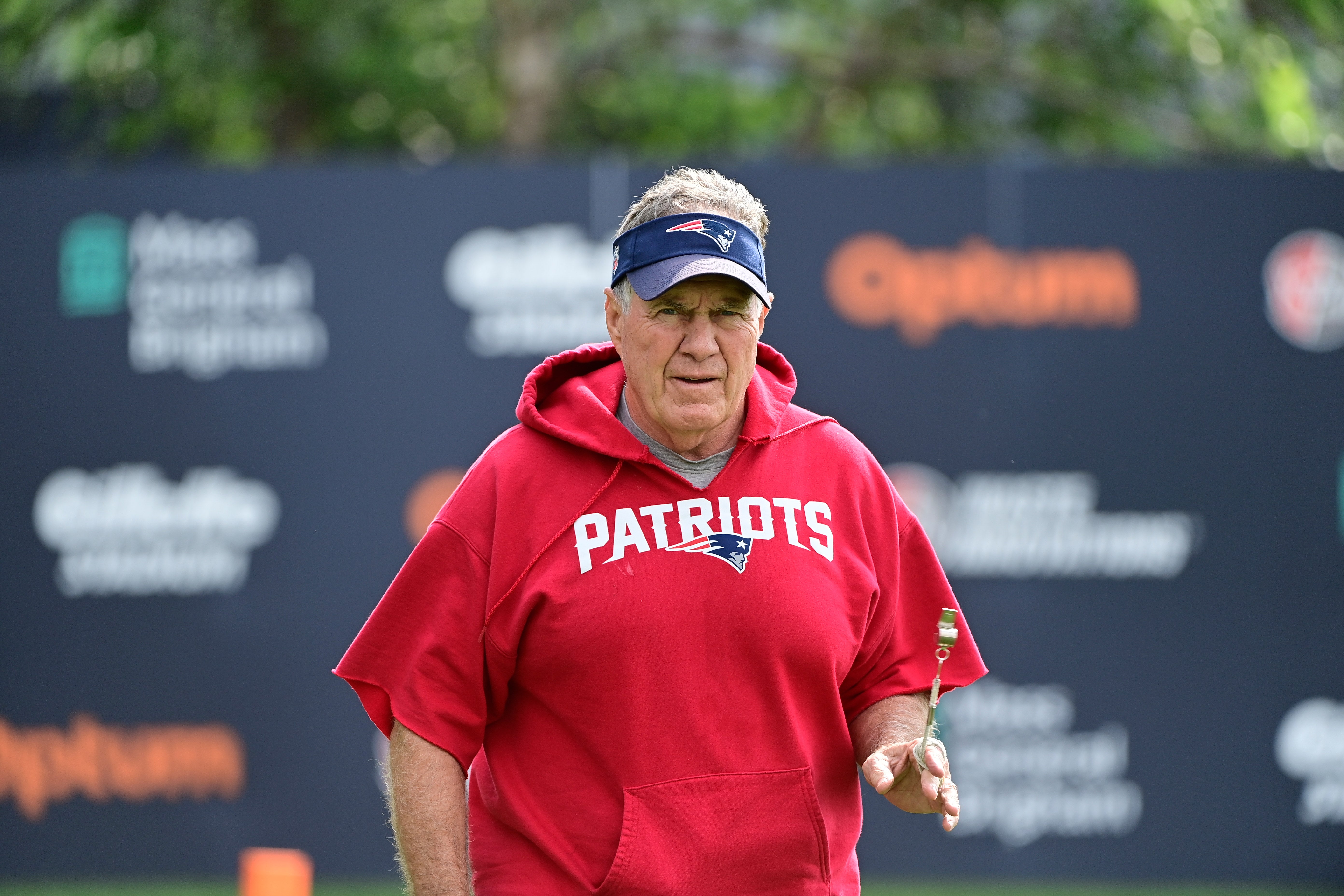New England Patriots head coach Bill Belichick heads to the podium for a morning press conference before training camp at Gillette Stadium.